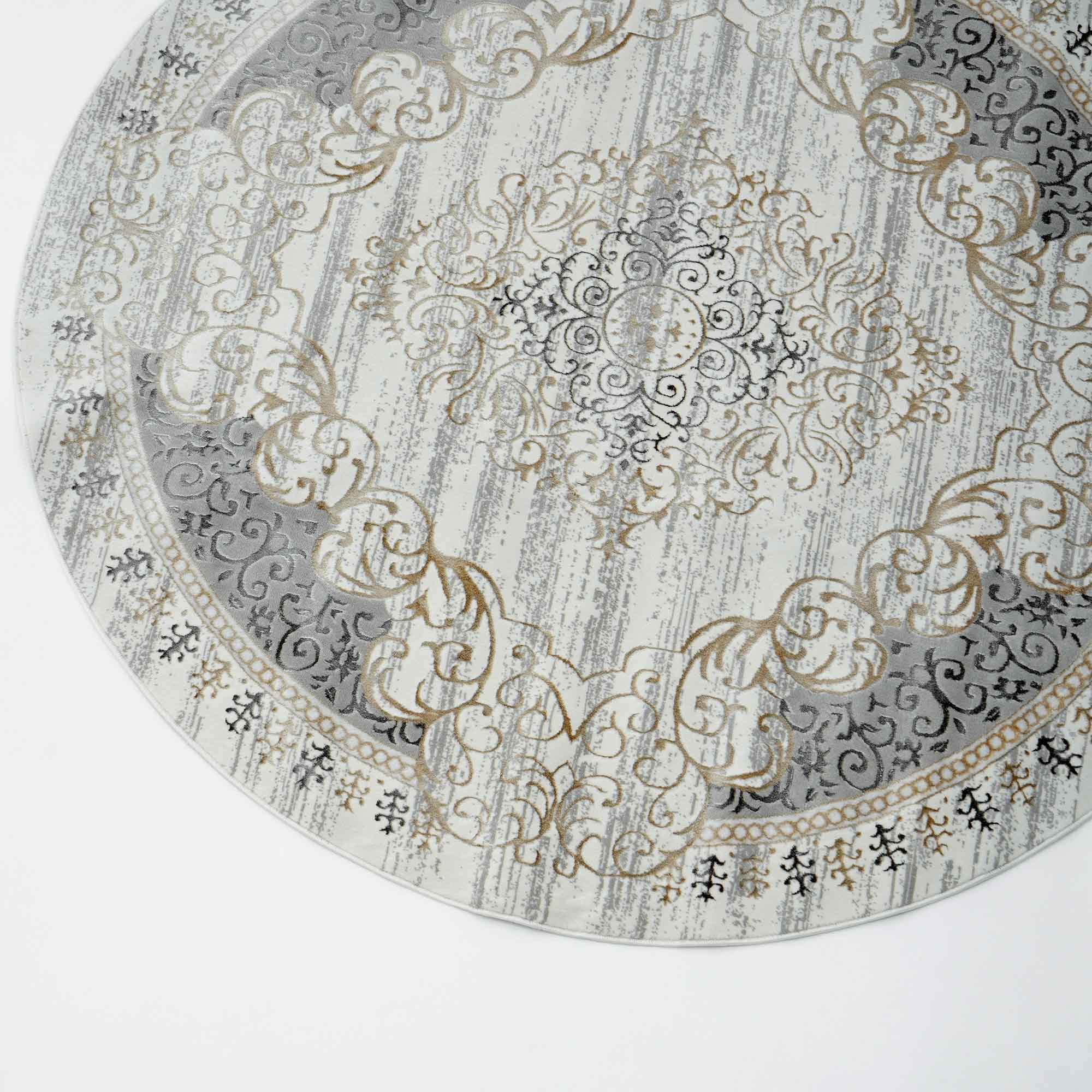 The RAMSHA HOME Light Grey Color NK36B 100% Polyester Silk Rug is a round, traditional rug with ornate gold, gray, and cream patterns in concentric circles and a vintage distressed look that adds elegance to any space.