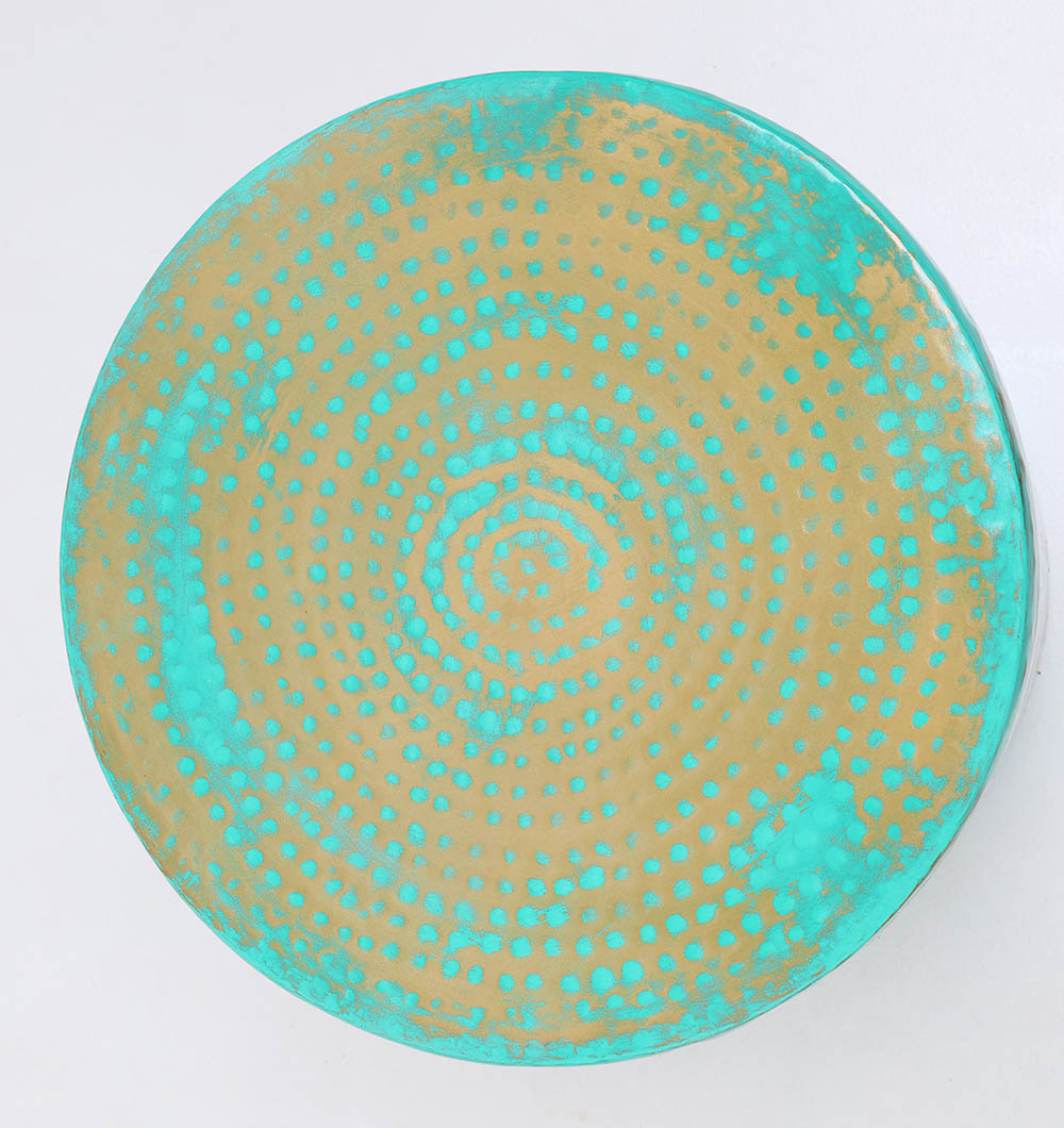 The RAMSHA HOME Modern Round Coffee Table With Spray Platina Color GH-007 features a gold base with turquoise dotted spiral patterns and patina accents along the rim, set against a light background.