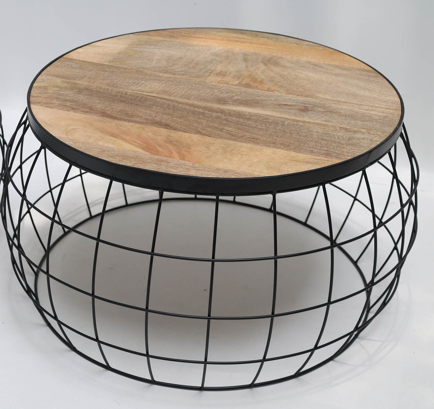 The RAMSHA HOME Industrial Nesting Side Tables (Set of 2) GH-068 feature solid wood tops and black metal wire bases, ideal for modern spaces seeking stylish, functional tables. Displayed against a plain white background.