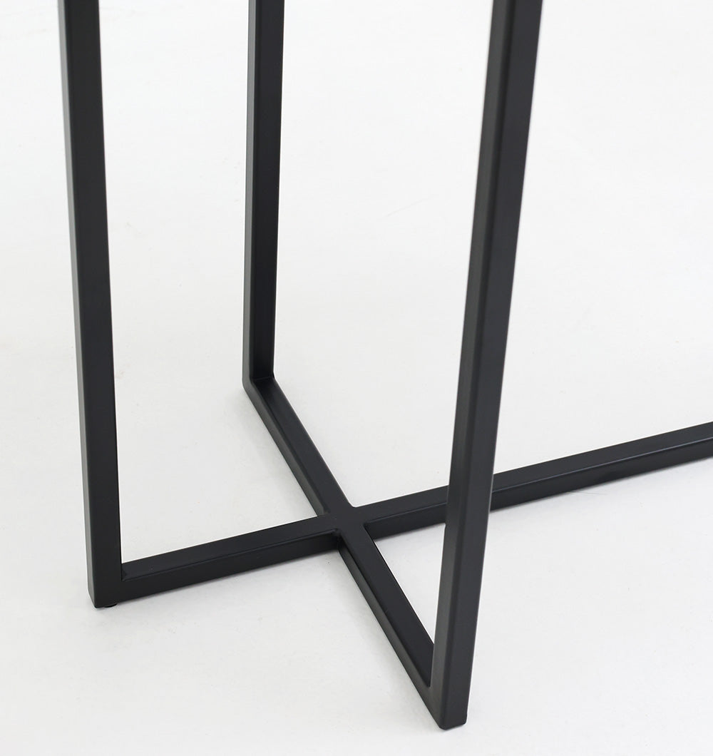 Close-up of the RAMSHA HOME Modern Dual-Tier Side Tables (GH-075-A), featuring intersecting black iron legs in an X shape and an antique brass finish—sleek accent pieces for contemporary rooms.