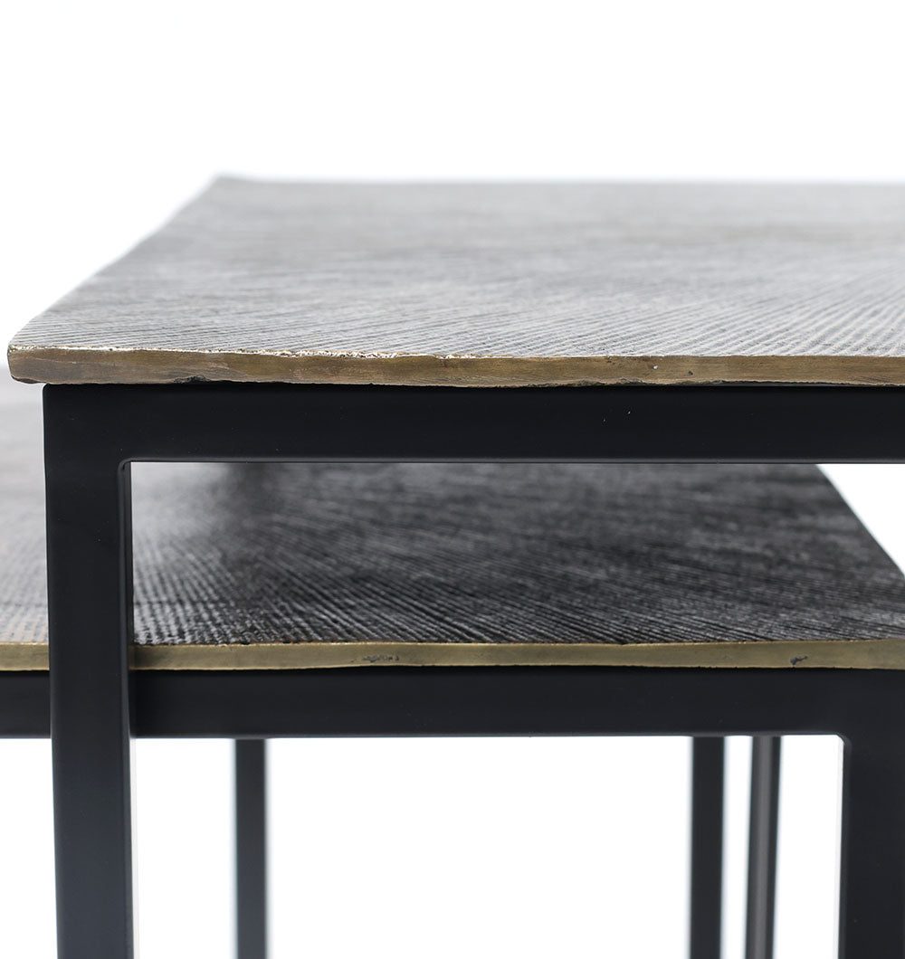 Close-up of RAMSHA HOME’s Modern Two-Tier Side Tables GH-078-A, featuring rectangular wood-look tops in a natural & silver powder finish and black iron base, showcasing modern design and detailed edges against a white background.