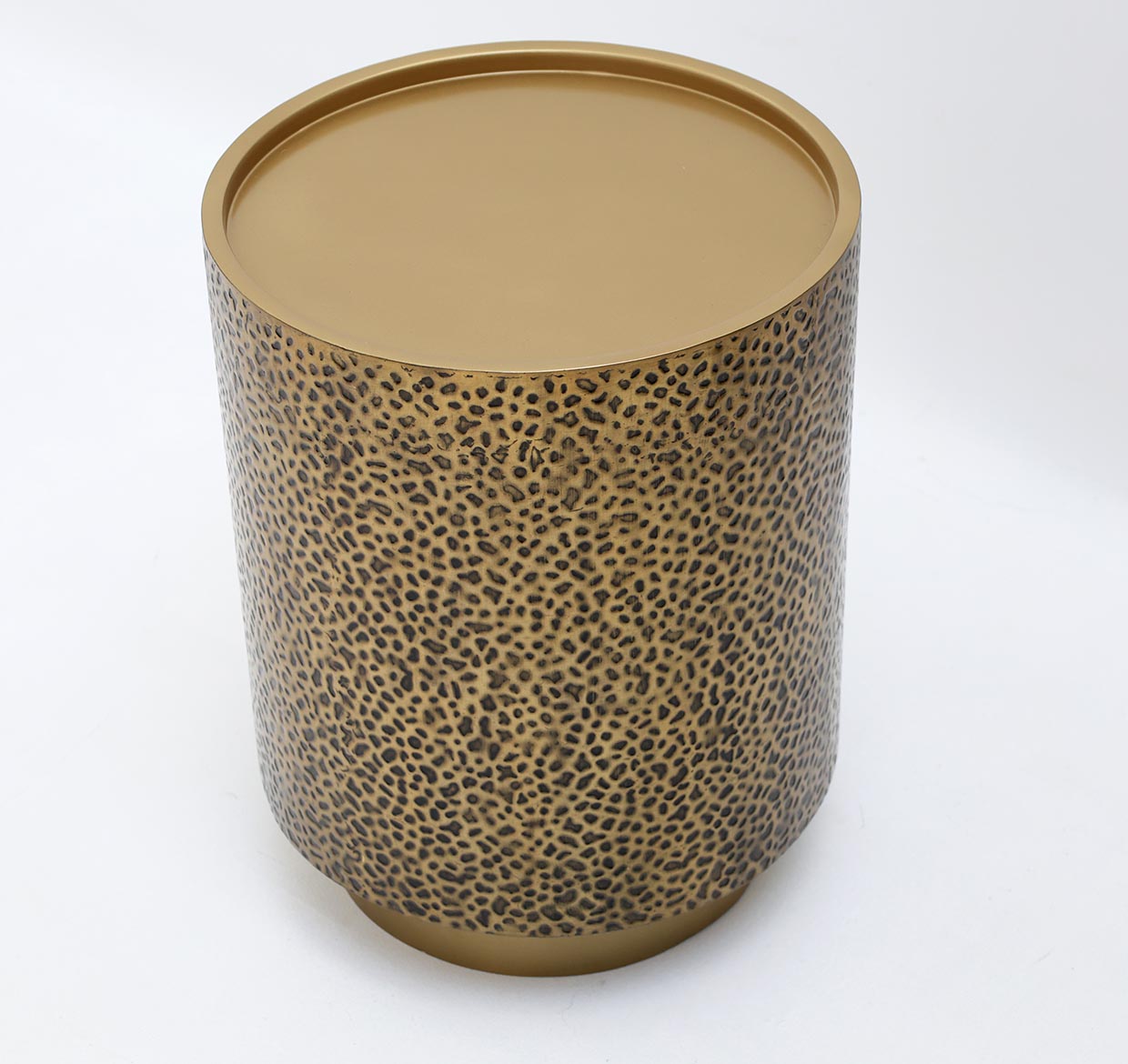 The RAMSHA HOME Luxury Iron Side Table GH-085 boasts a golden finish and textured design, featuring a flat top with a base in a black and gold spotted pattern, making it stand out against the plain white background.