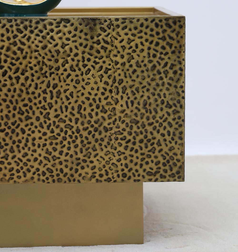 Close-up of the RAMSHA HOME Luxury Square Iron Side Table GH-086, featuring a golden finish with a textured design—an elegant choice to enhance modern spaces.