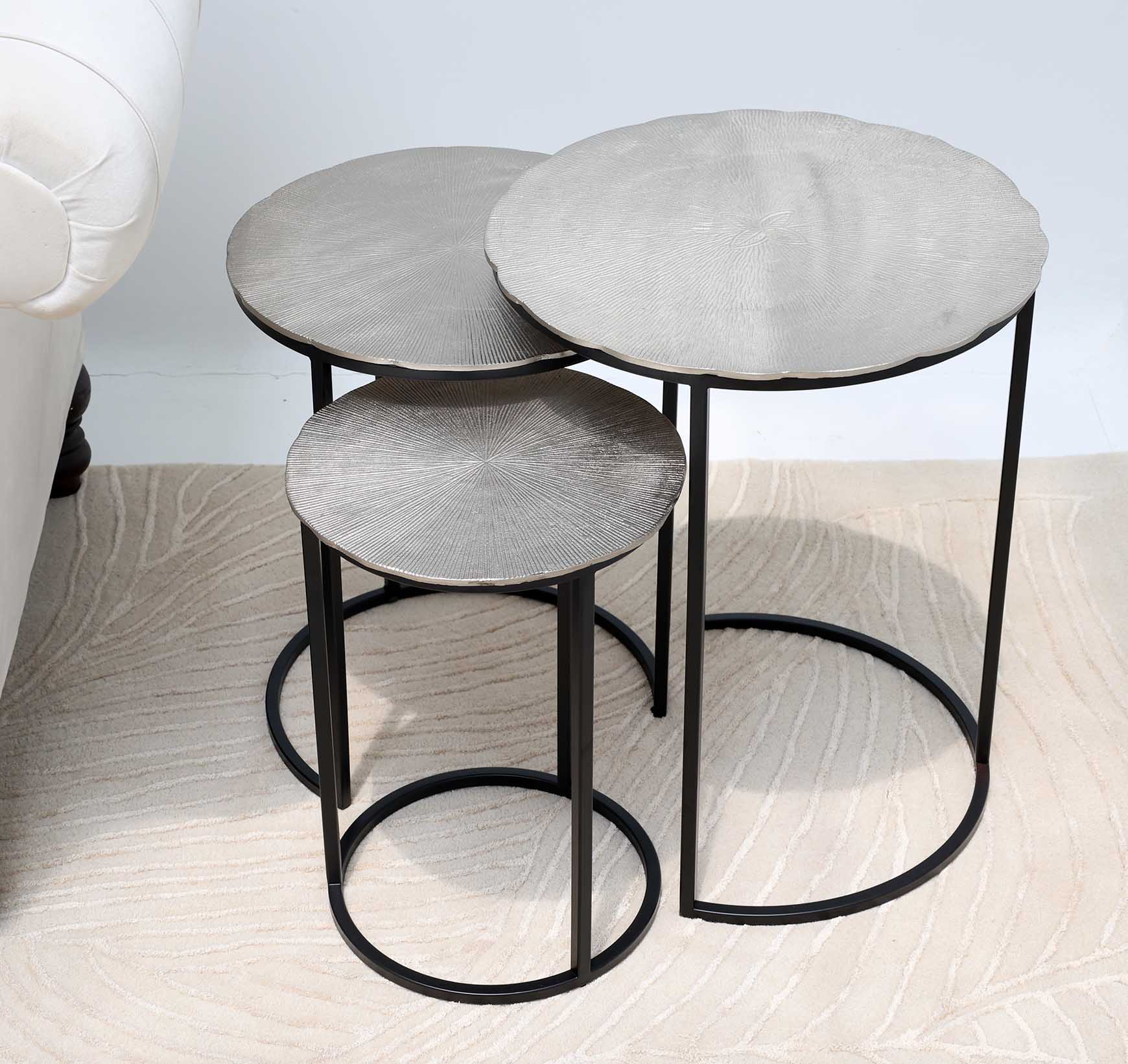 The RAMSHA HOME Set of 3 Modern Nesting Side Tables (GH-111-A) features antique brass tops and a grey iron base, offering sleek, versatile style next to your sofa and bringing contemporary elegance to any living area.