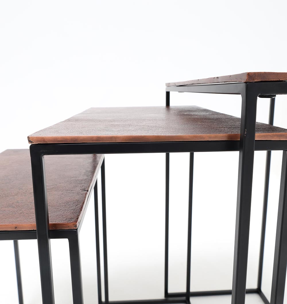 A close-up of the RAMSHA HOME Modern Three-Tier Side Tables GH-111-B, featuring black powder/copper-finished tray tops and a black iron base, arranged by height against a white background.