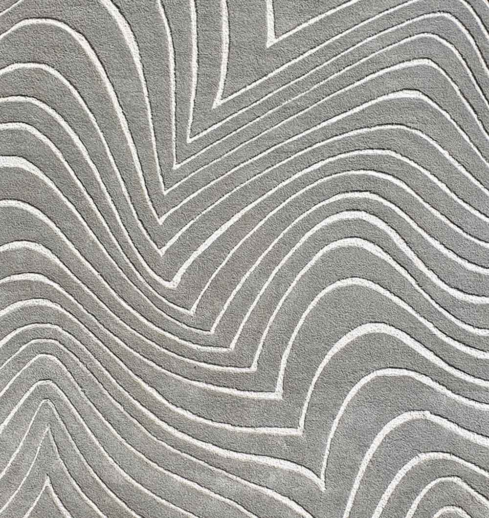 Close-up detailing the synthetic resilience and soft hand-feel of the polyester performance blend fibers.