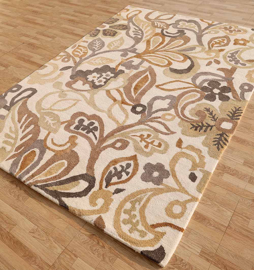 The RAMSHA HOME Modern Polyester Handmade Carpet 170x240 Multi – HTP-24 features an abstract floral design in beige, brown, tan, and cream tones, adding style to a light wood floor.