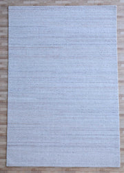 The RAMSHA HOME Natural Ivory Handmade Wool Rug – Modern Luxury Area Rug HTP 28, a large rectangular piece with subtle horizontal patterns and minimalist design, is shown on a light wood floor from above.