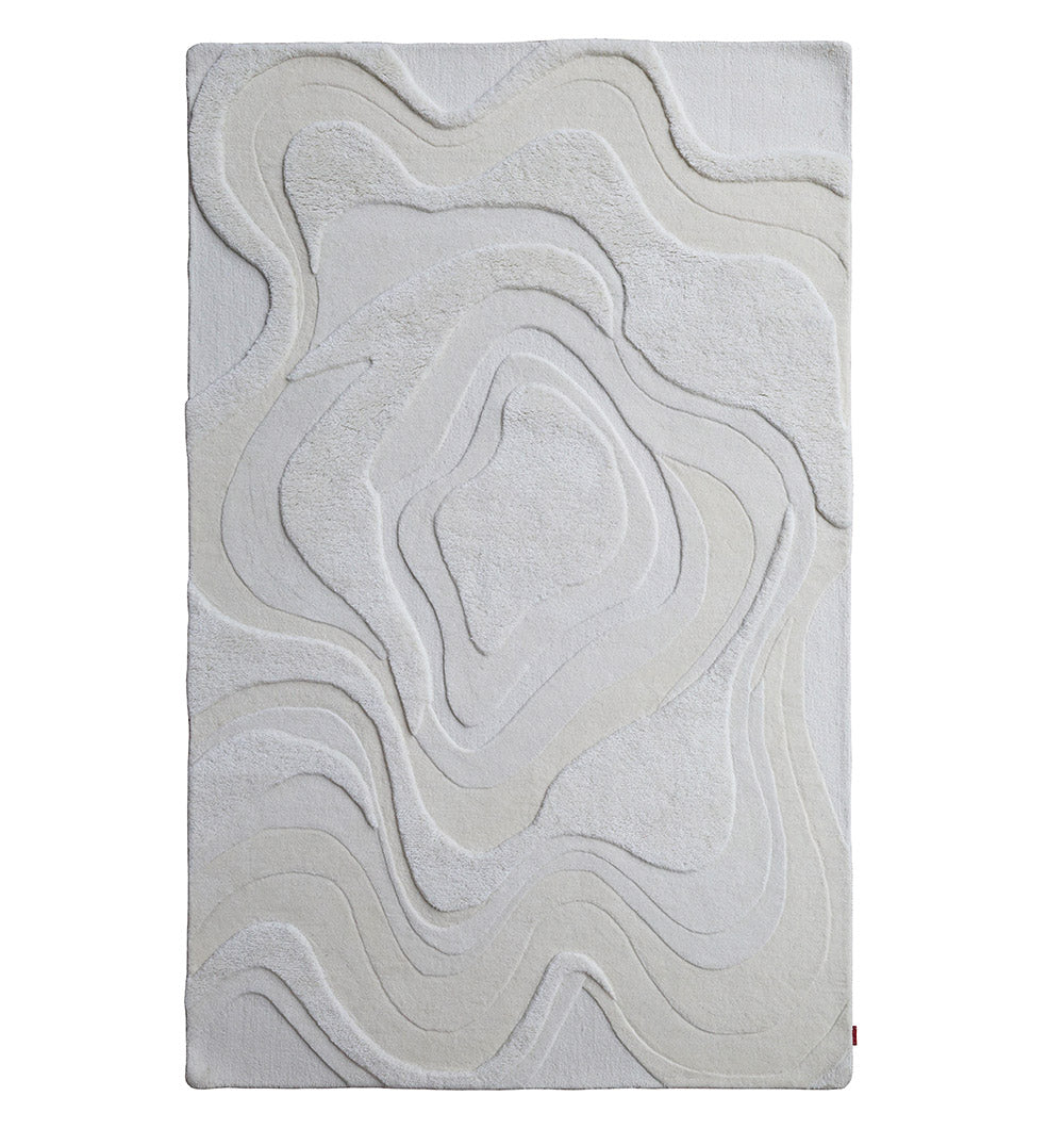 The RAMSHA HOME Luxury Off White Handmade Area Rug - HTW 114 (200x300 cm) features layered, wavy patterns that resemble topographic contour lines, creating a striking three-dimensional effect on its neutral rectangular surface.