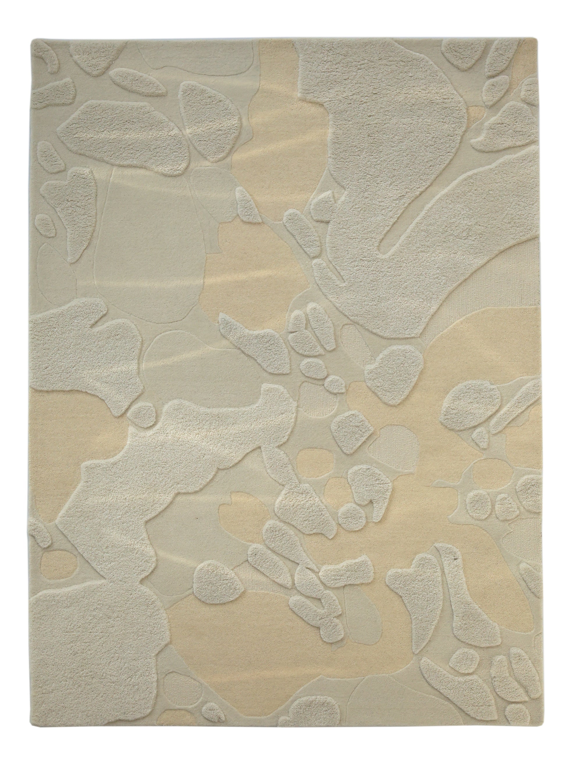 The RAMSHA HOME Creative Multi Color Wool & Cotton Handmade Rug - HTW 69 (200x300cm) features a textured, modern abstract design with overlapping beige and cream shapes to complement any space.