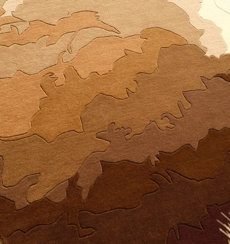 The RAMSHA HOME Handmade Shape Brown Color Area Rug - HTW 86 features irregular tan and brown shapes in a layered, organic pattern, handtufted in wool to evoke a topographic look and add depth to any space.