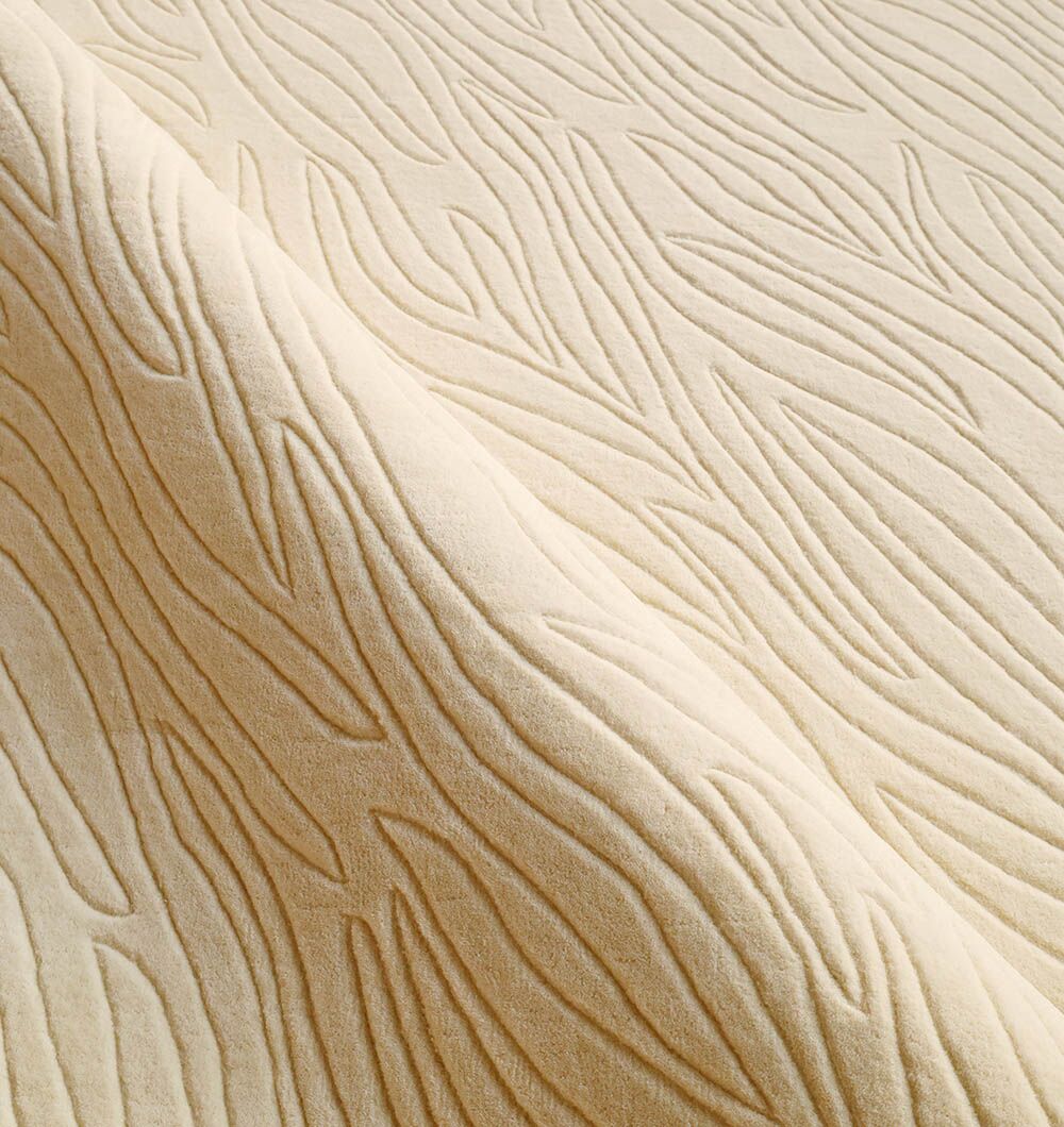 A close-up of the RAMSHA HOME Natural White Color Handmade Area Rug HTW-89 (300x400 CM) showcases its textured, raised wavy lines—offering a nature-inspired, minimalist design ideal for neutral rug enthusiasts.