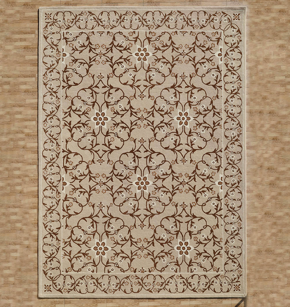 The Exquisite Multi Color Decor Handmade Rug - HTW 99 (300x400 CM) by RAMSHA HOME, featuring a beige and brown floral vine design with a decorative border, is placed on a light wood floor.