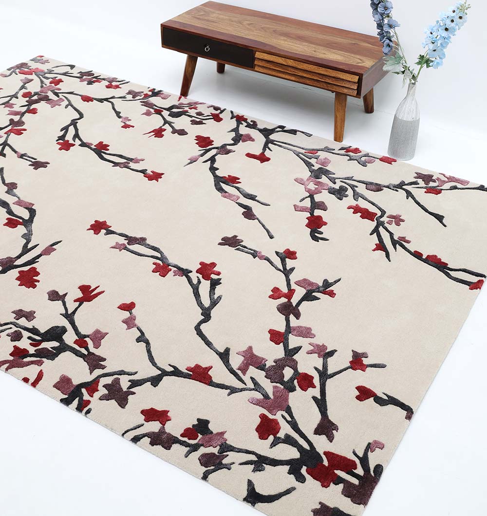 Rectangle multi color rug placed in a living space, adding depth and warmth with its rich, harmonious hues.