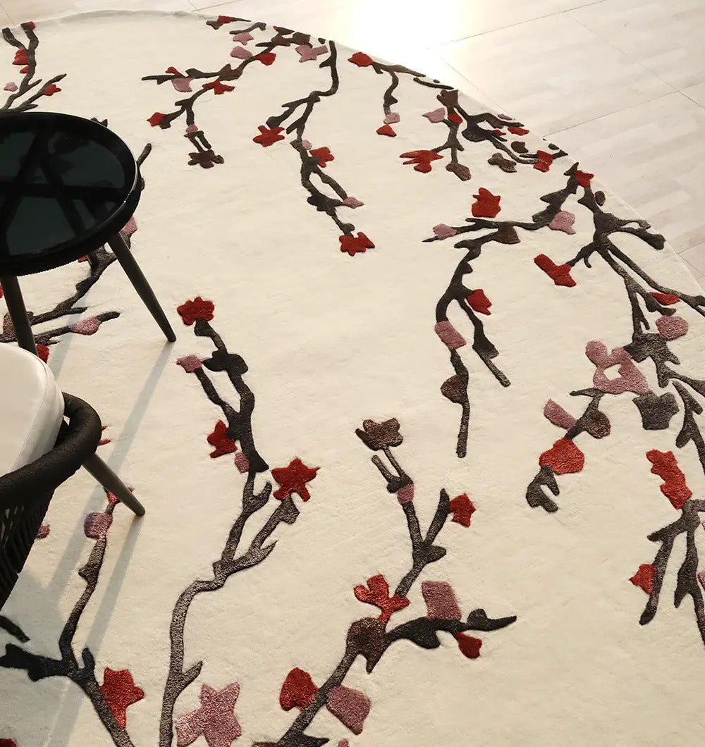 Overhead shot of the irregular rug, showing how the rich, harmonious hues are distributed across its unique surface area.