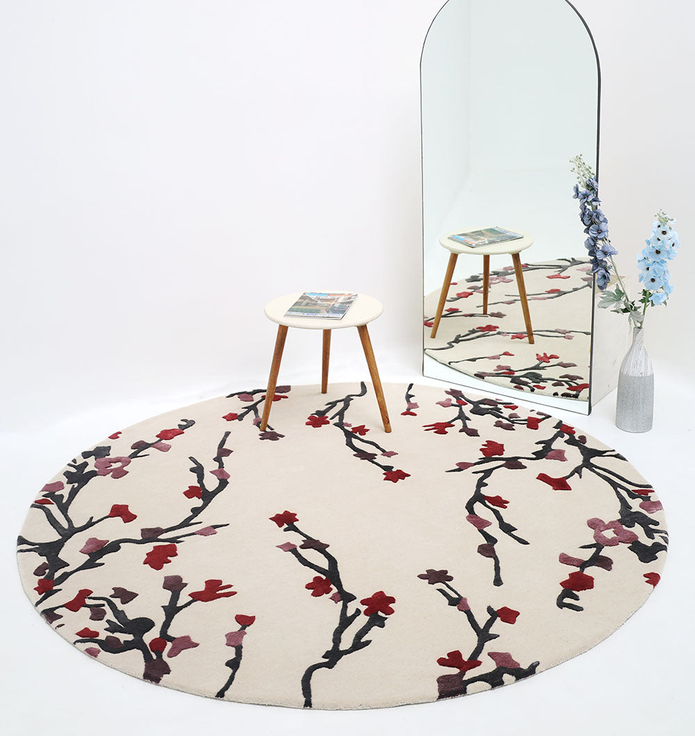 Round rug placed under furniture, showcasing its enduring quality and adding a stylish accent to the room.