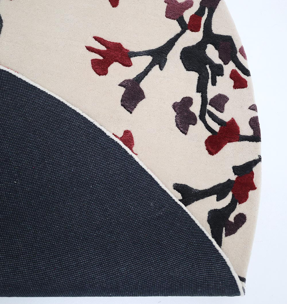 Back view of the round handmade rug, highlighting the robust construction and 50% Wool, 30% Viscose, 20% Cotton blend.