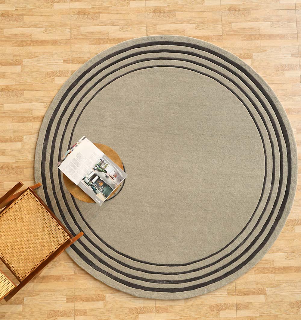 Handmade black and grey area rug offering a distinctive look with sophisticated tones, adding depth and elegance.