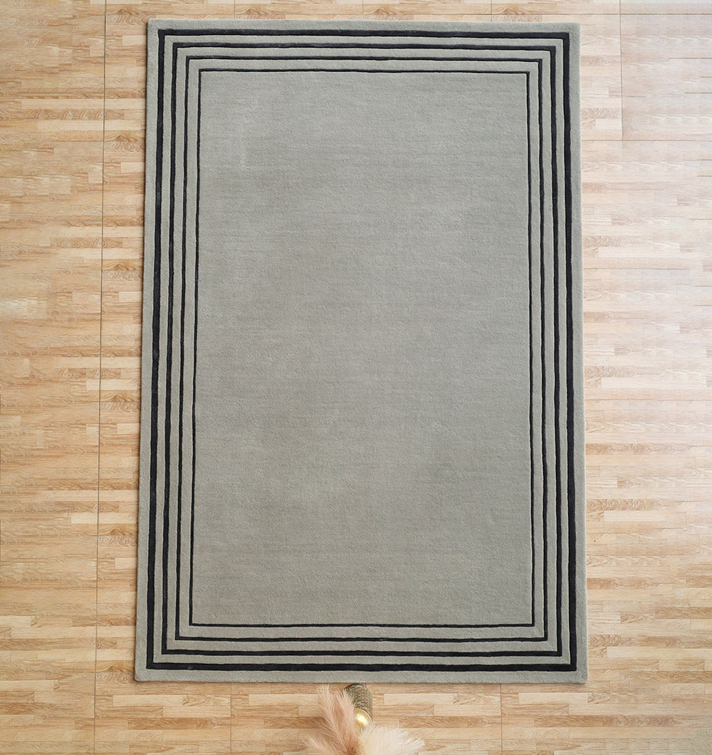 Main product image of the rectangular black and grey rug, crafted with precision for a timeless, elegant look.