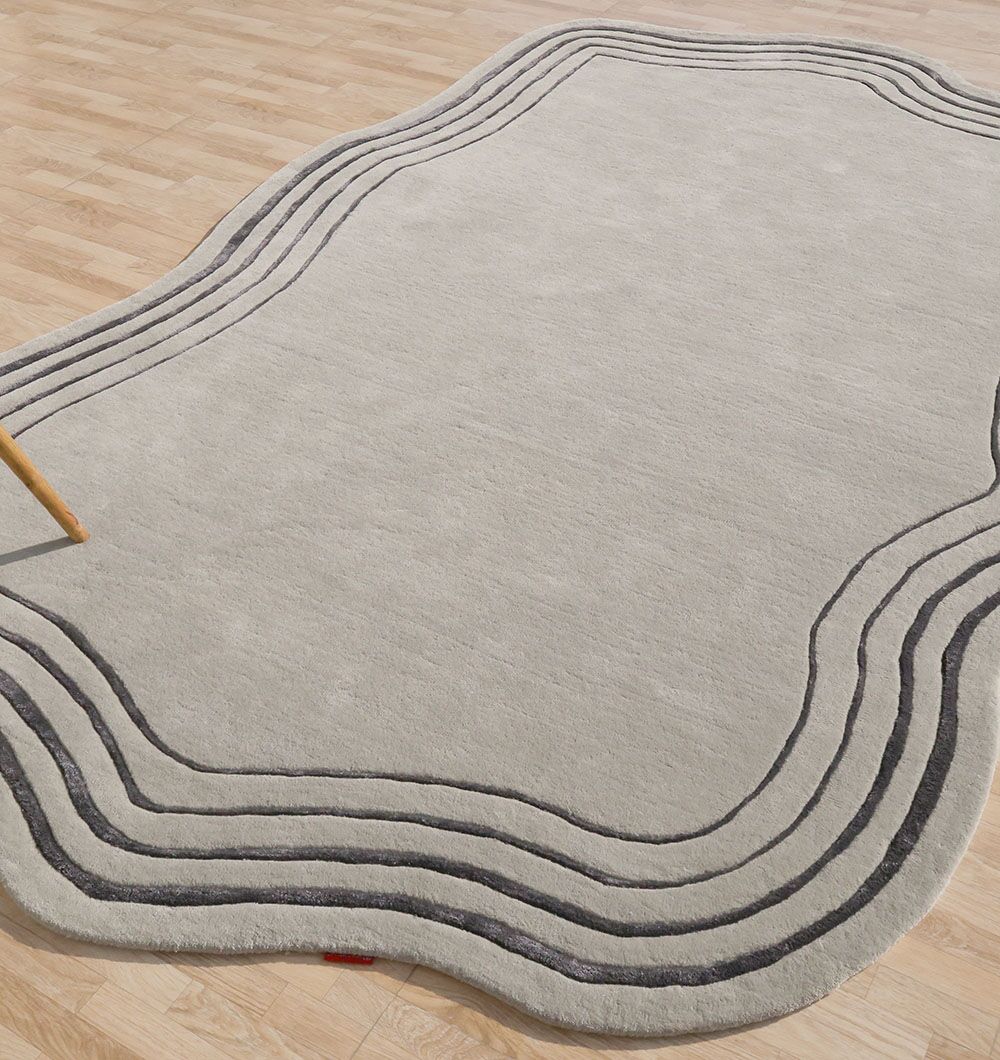 Side angle of the shaped rug, detailing the robust handmade construction and edge finish for long-term durability.