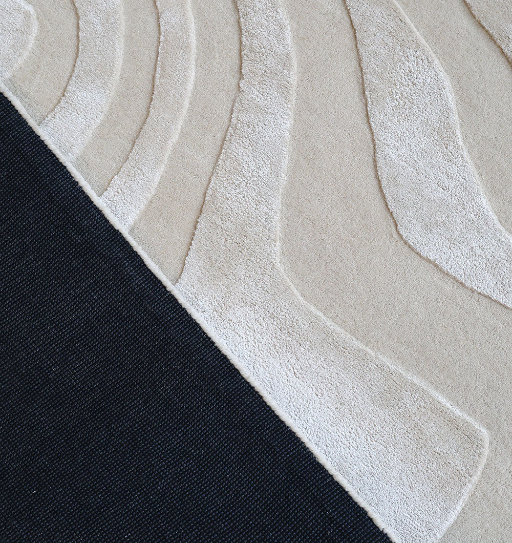 Reverse side of the hand-tufted rug, highlighting the durable foundation built for enhanced longevity.