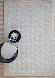 Handcrafted rectangle rug bringing warmth and sophistication to the living room décor.