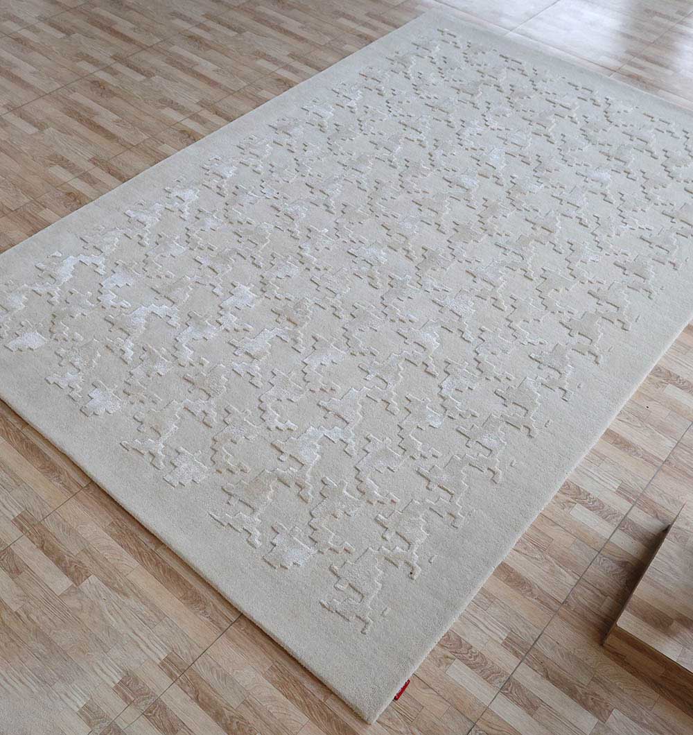 Angled shot of the beige rectangle rug, anchoring the living room décor with understated elegance and sophistication.