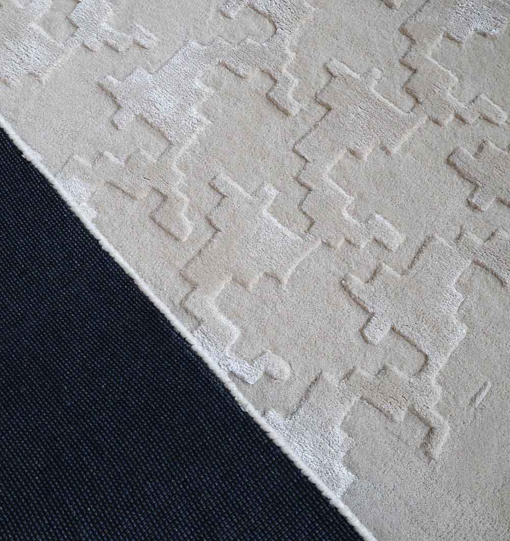 Reverse view of the hand-tufted rug, highlighting the durable backing that withstands daily wear.