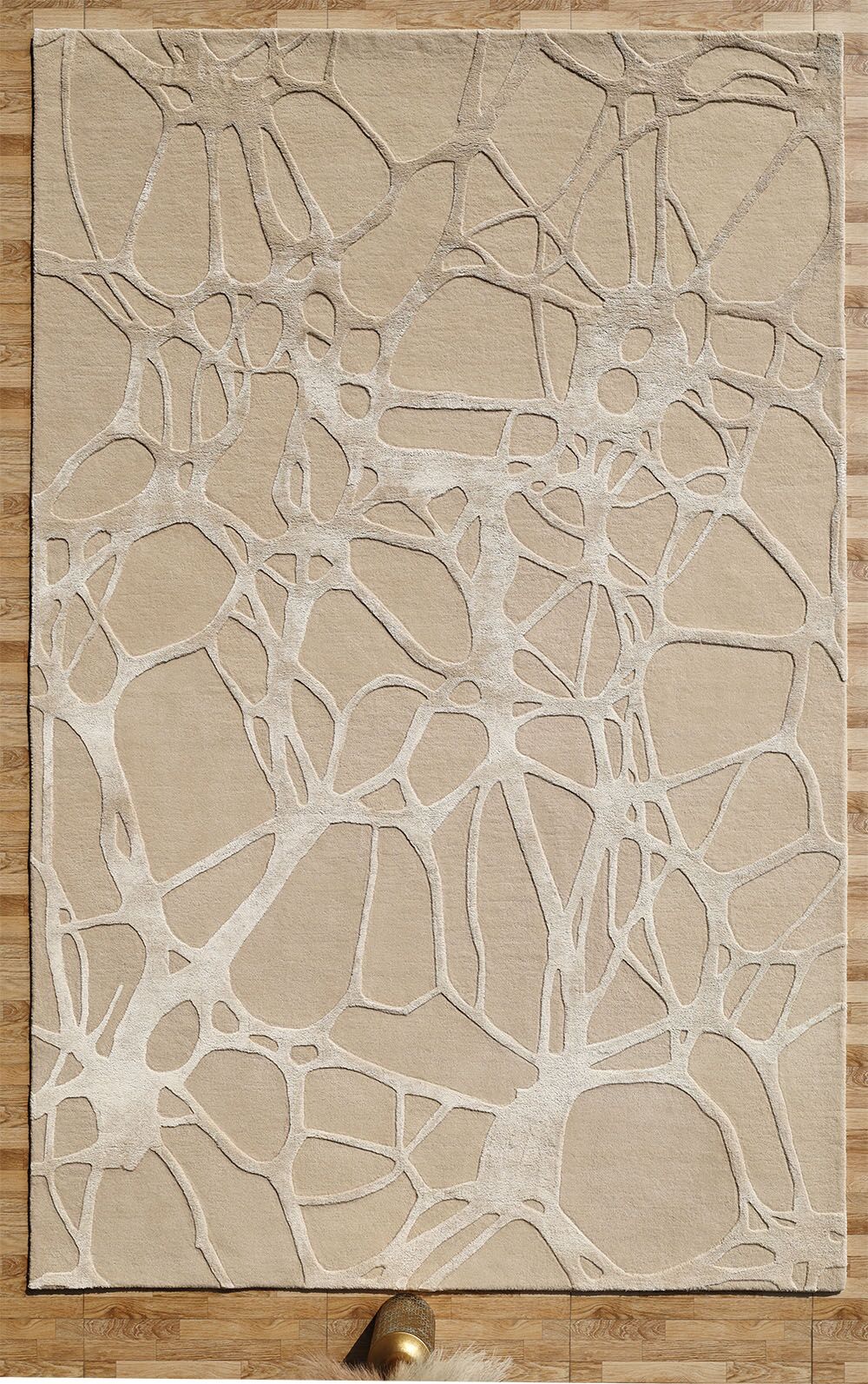 The RAMSHA HOME Natural White Color Handmade Area Rug (HTWV-145, 200x300 cm) features an abstract web-like pattern in light tones, placed on a wooden floor with a round object partly visible at the bottom edge.