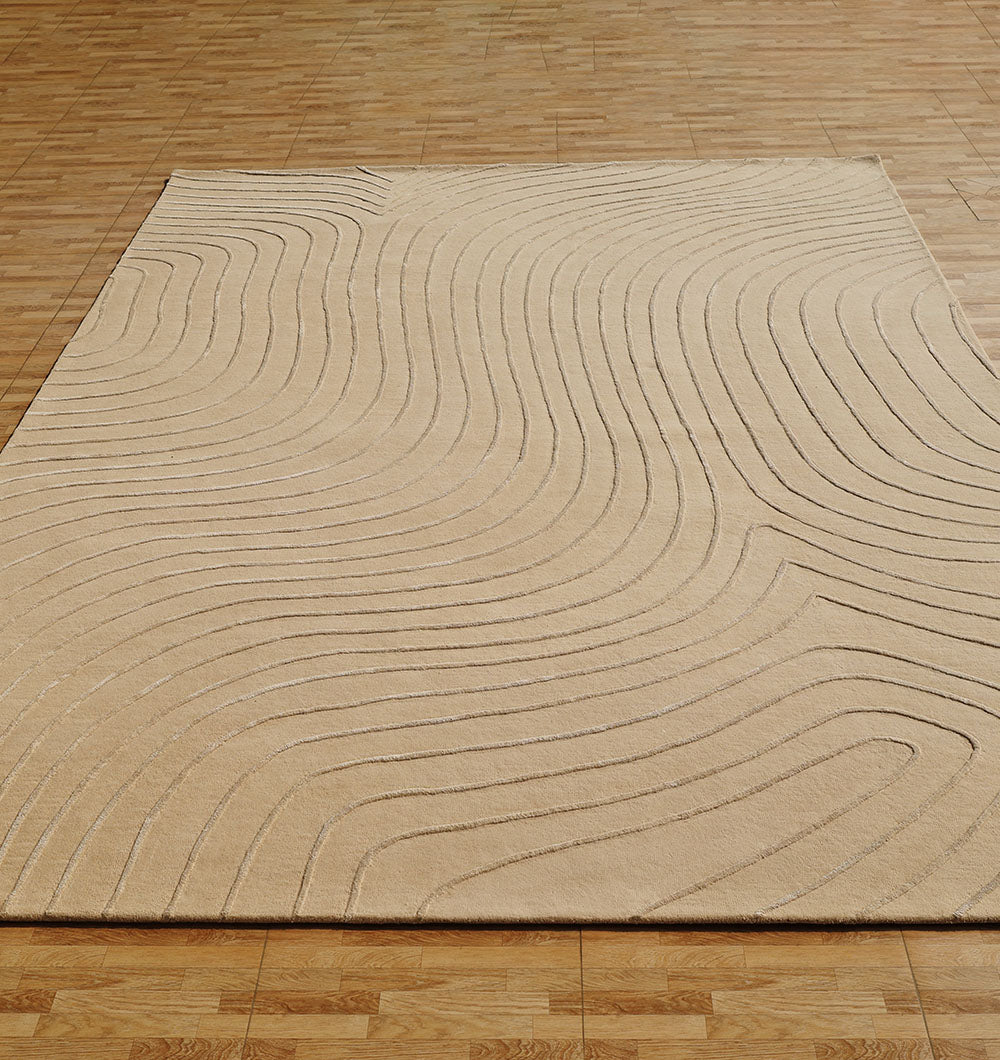 The RAMSHA HOME Beige Color Handmade Decorative Area Rug - HTWV 161 (300X400 cm) features raised, wavy patterns reminiscent of topographic contours, adding subtle texture and earth-toned style to any space.