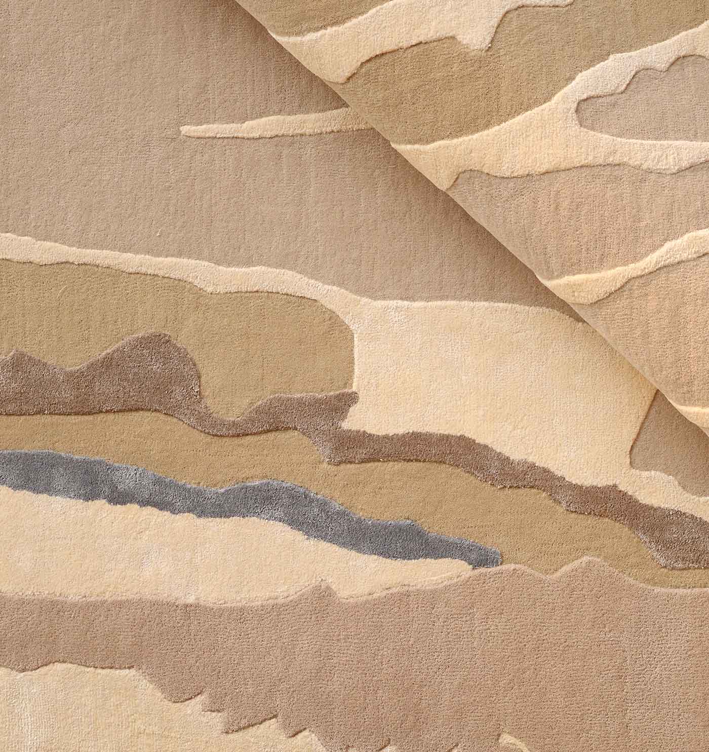 The RAMSHA HOME Classic Rectangle Handmade Area Rug- HTWV 177 (300x400 cm) showcases layered, wavy patterns in cream, taupe, and gray with a folded corner to display its texture and thickness.