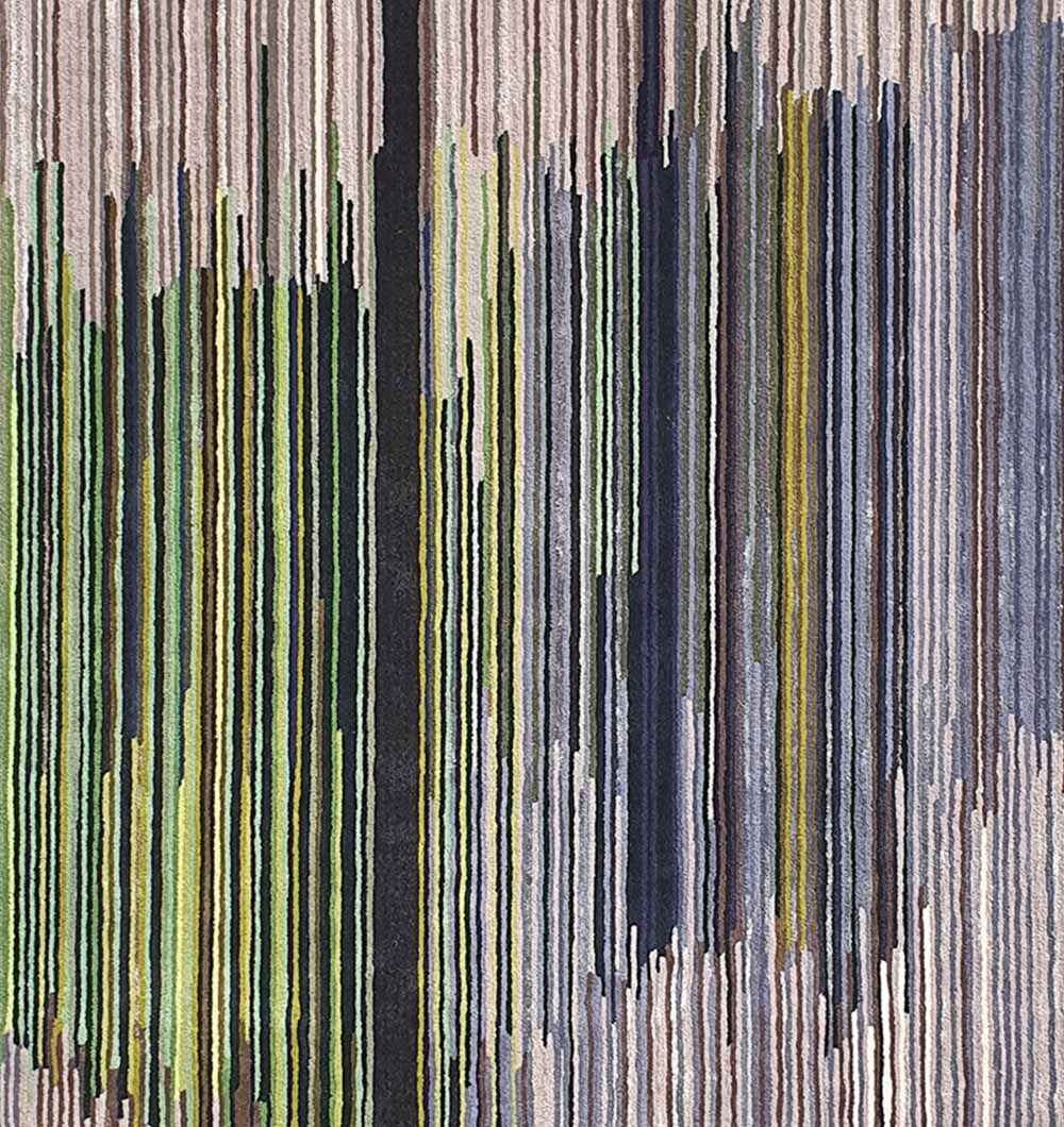 Close-up image detailing the complex pattern and varied color arrangement of the tufted surface.