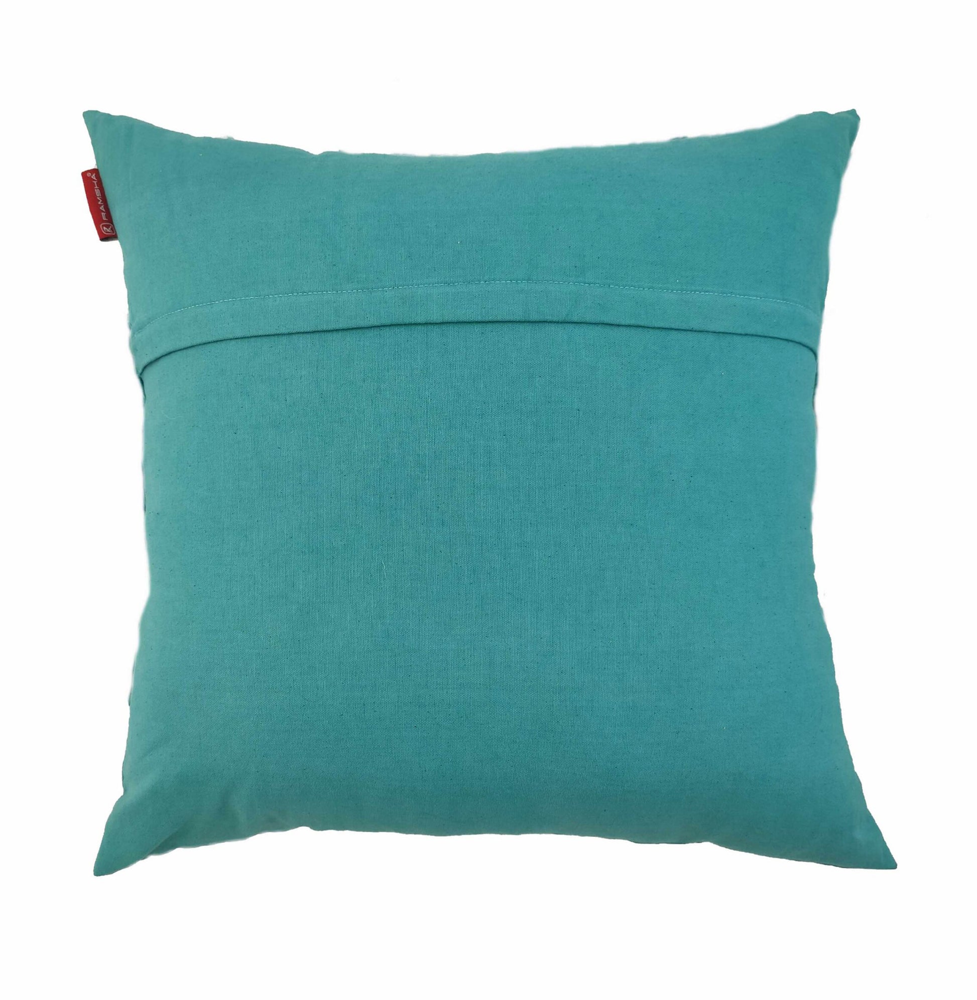 The Macrame Cotton Cushion With Filler by RAMSHA HOME features a plain square turquoise cover, a horizontal back seam, and a small red tag—an ideal accent to elevate your home decor with style.
