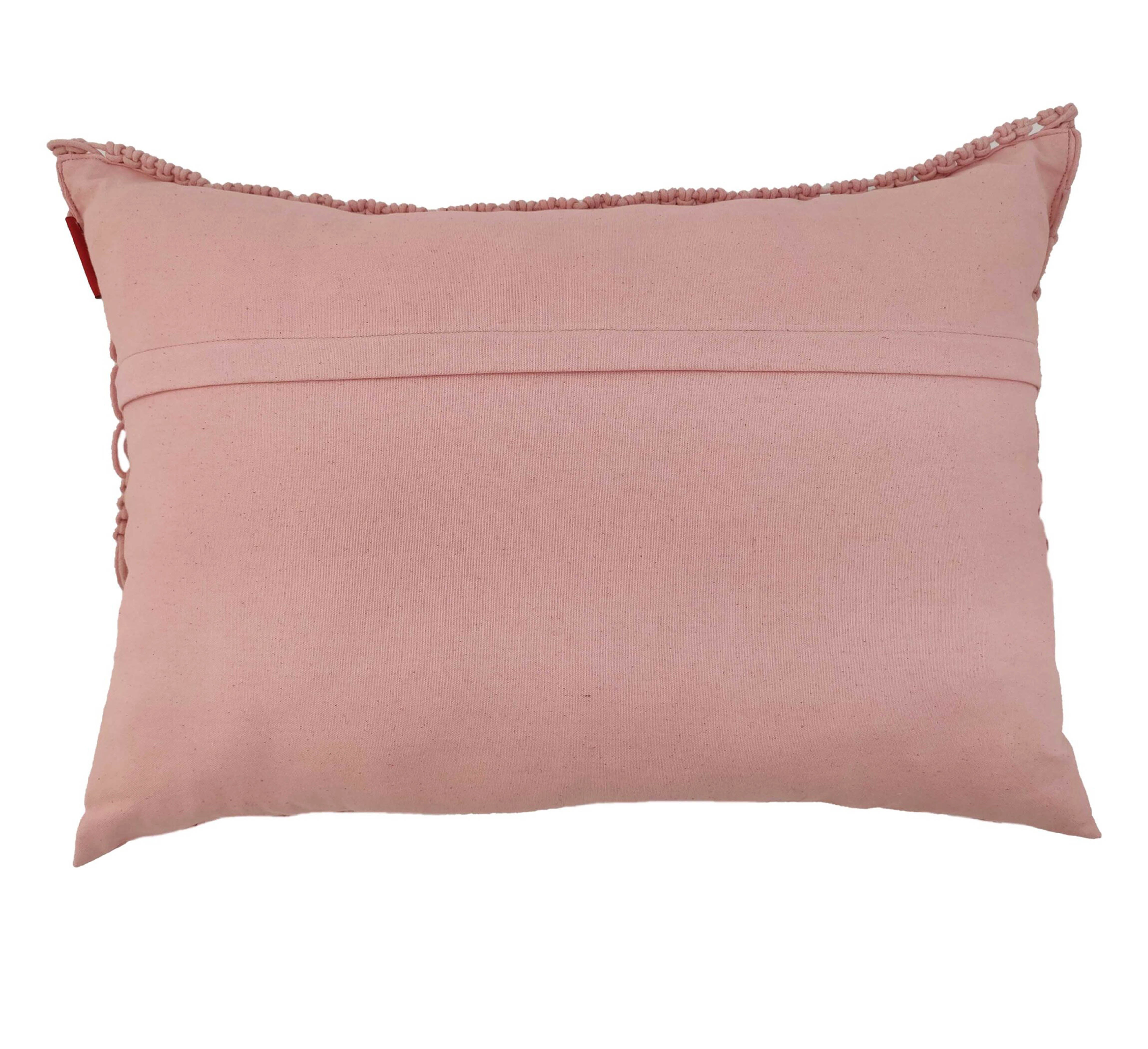 The RAMSHA HOME Macrame Cotton Cushion With Filler is a rectangular, light pink cushion featuring a plain back, horizontal stitched band, and delicate ruffled trim on top—ideal for adding charm to your home decor. Shown against a white background.