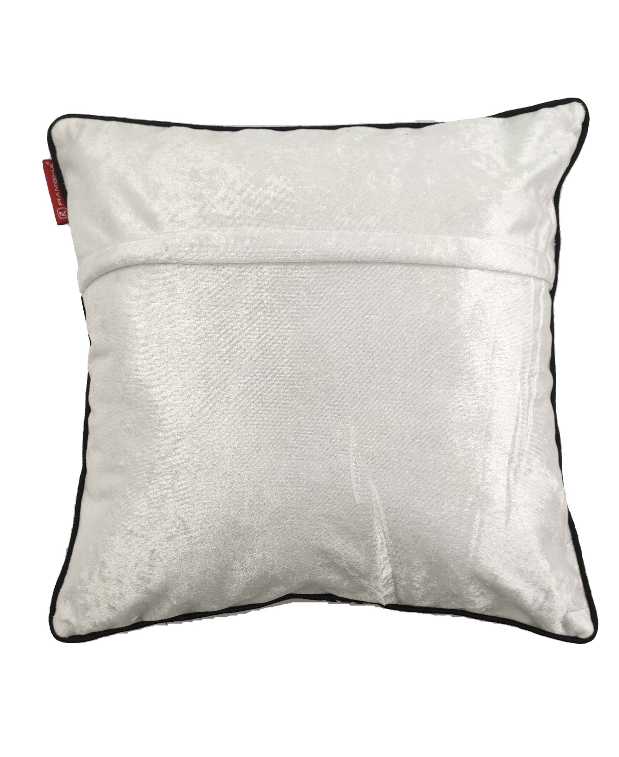 The RAMSHA HOME Polyester Cushion Cover (White & Black, CS-073) features a white velvet texture, front pocket, black edge piping, and a red fabric tag—adding a stylish touch to your décor.
