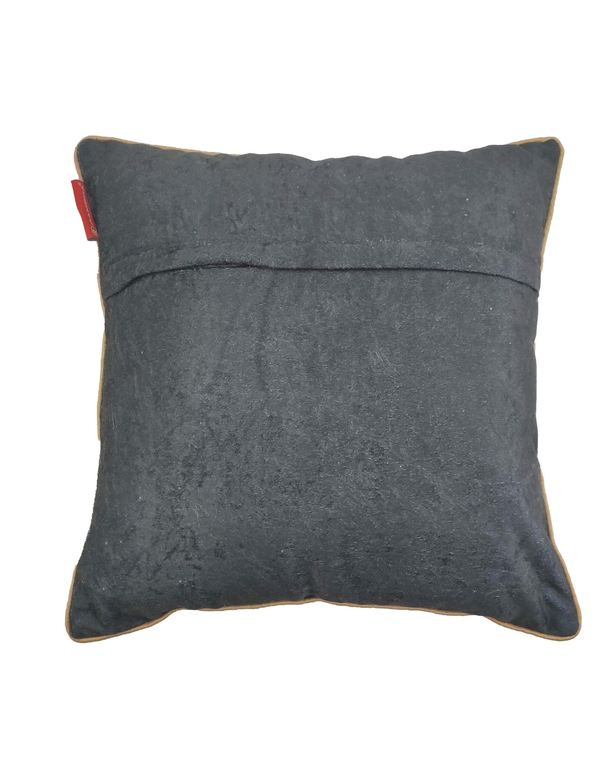 The Black & White Polyester Cushion Cover CS-072 by RAMSHA HOME features a modern square black design with a visible seam and red fabric tag, ideal for contemporary decor and displayed on a crisp white background.