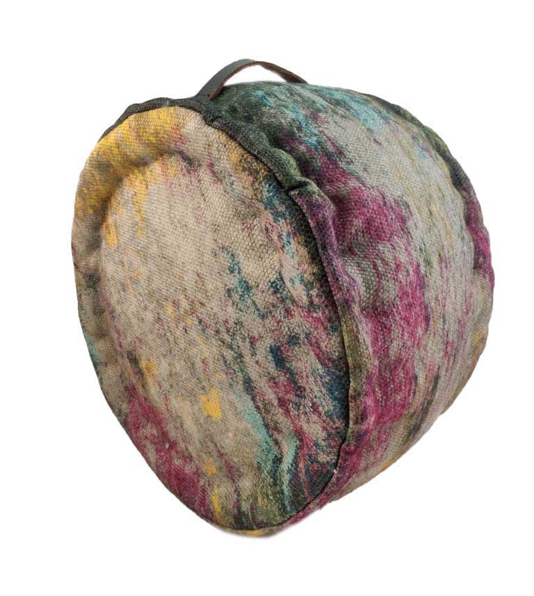 The RAMSHA HOME Printed Multi Color Pouf With Leather Handle is a round fabric meditation cushion featuring an abstract pattern in green, purple, yellow, and beige, finished with a handy top leather handle.