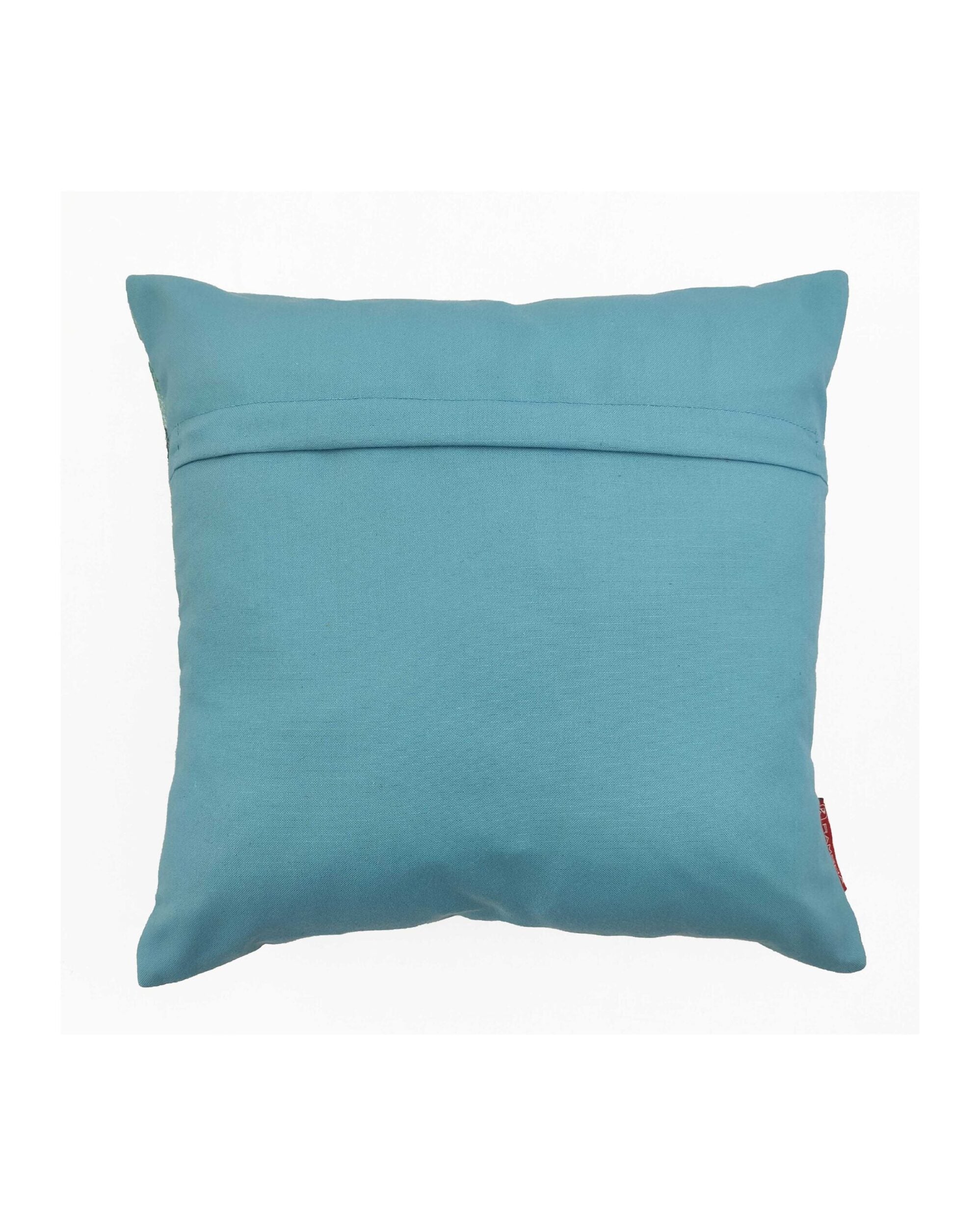 The RAMSHA HOME Cushion Cover Multi Color CS-069 is a square teal polyester cover with a visible horizontal seam near the top and a small red tag on the lower right, shown on a plain white background. Add style and durability to your space with this cover.