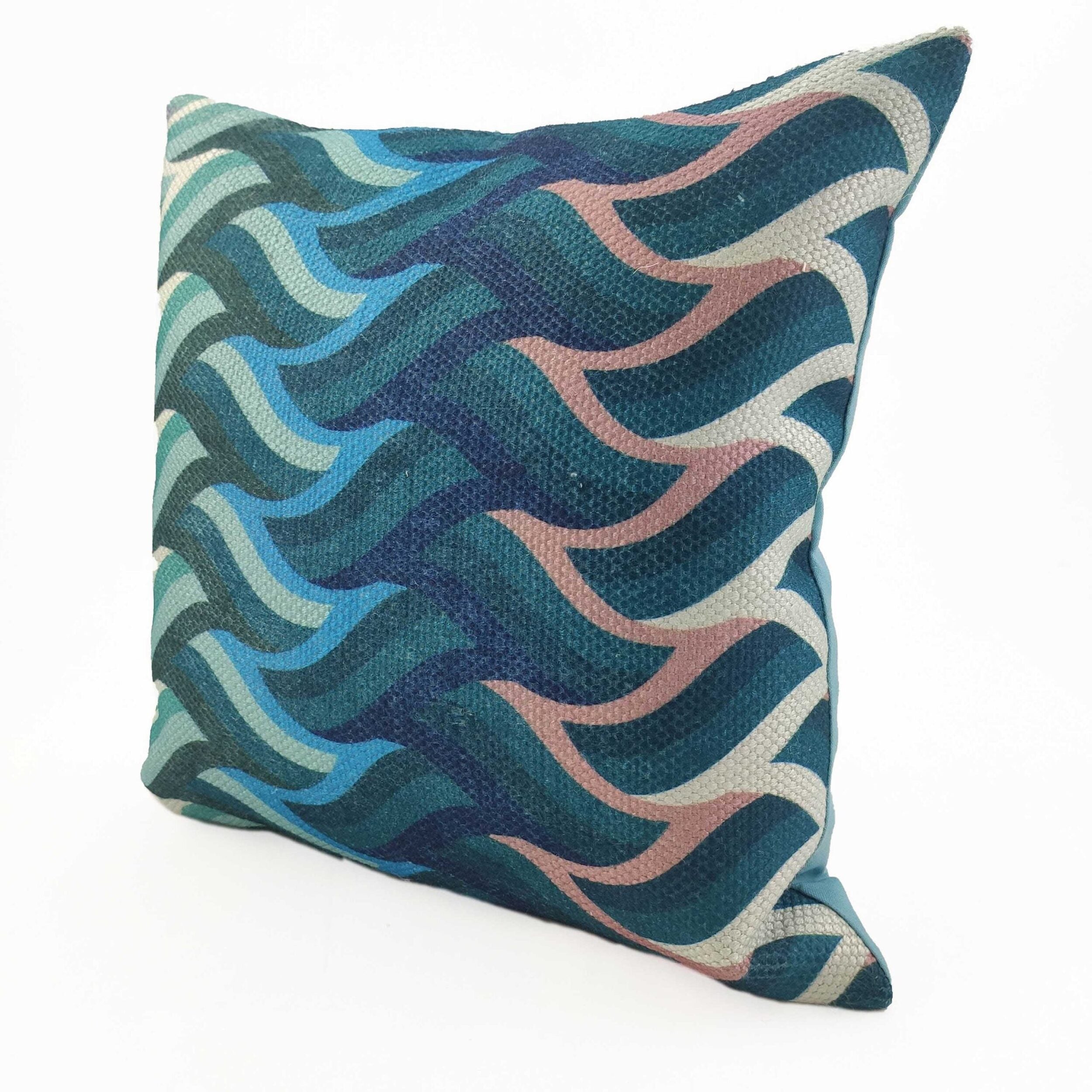 The RAMSHA HOME Cushion Cover Multi Color CS-069 features a square, durable design with a wavy geometric pattern in blue, teal, pink, and white on textured fabric against a plain white background.