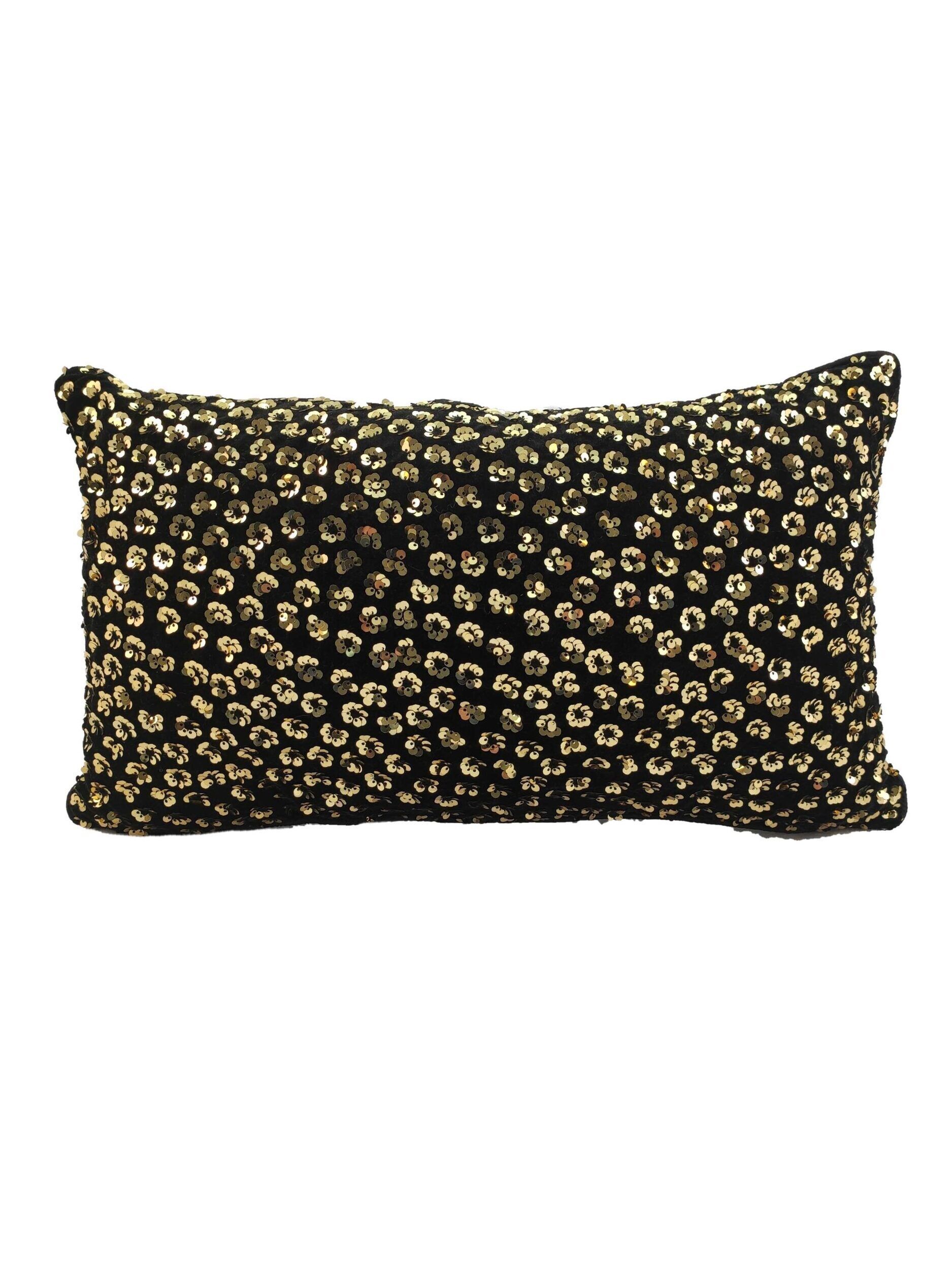 The RAMSHA HOME Polyester Cushion With Filler is a rectangular black cushion, embellished with evenly distributed gold and silver sequins, perfect for comfortable seating.