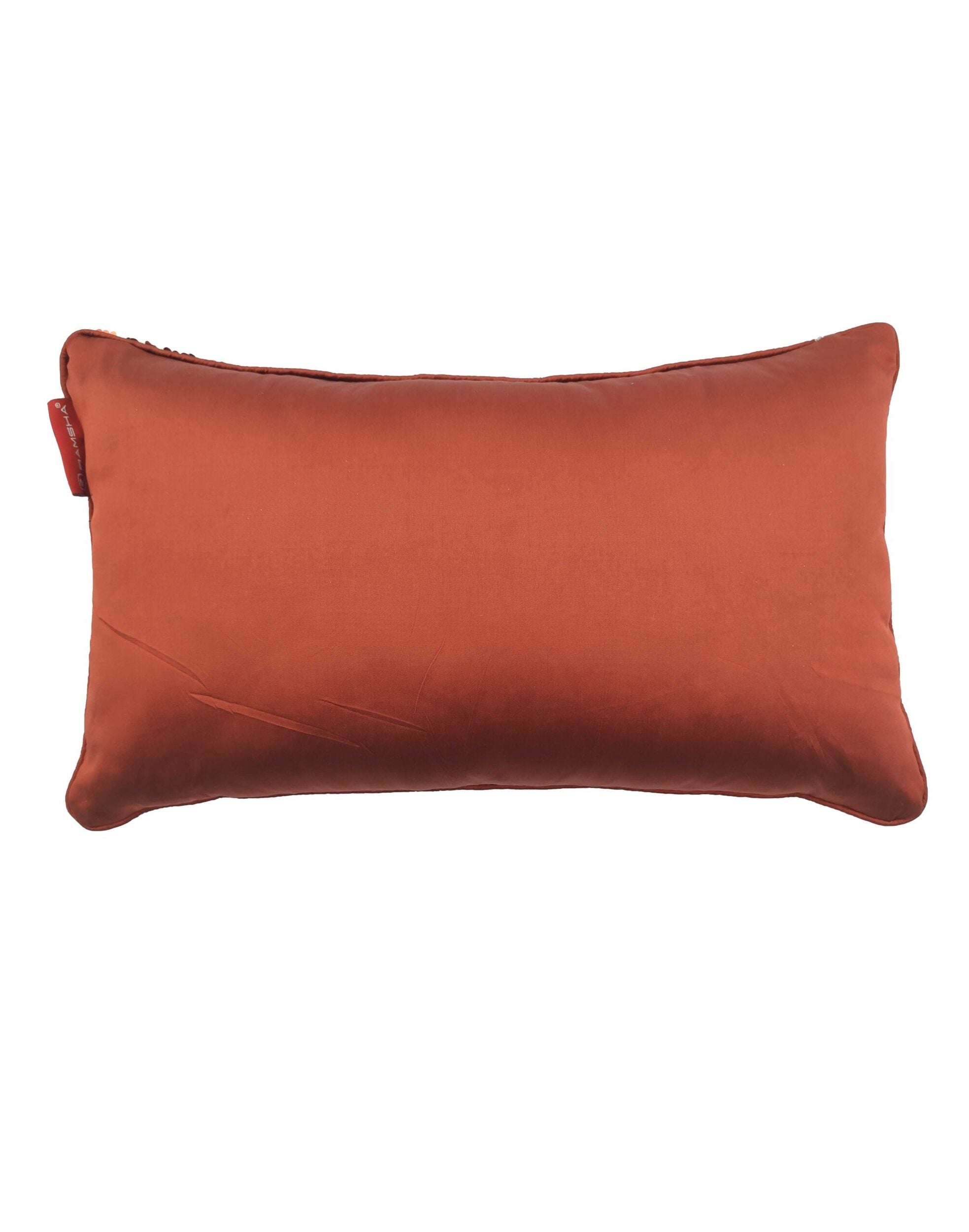The RAMSHA HOME Polyester Double Color Changing Cushion With Filler, rectangular and rust-colored, features a small red tag on the left edge and is displayed against a white background.