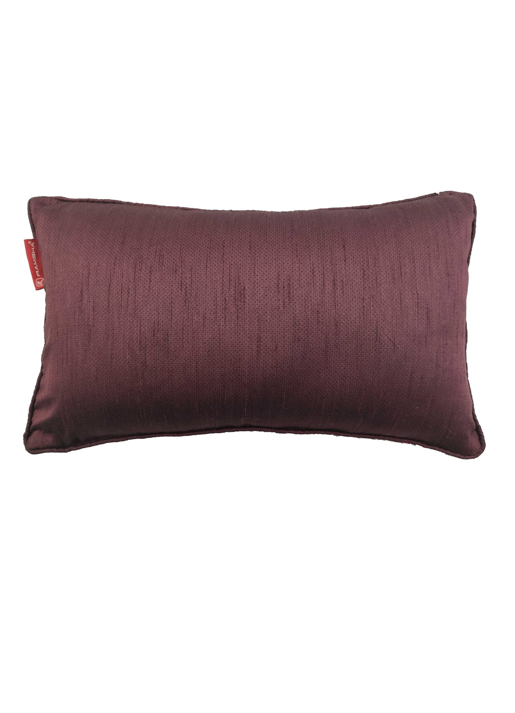 The RAMSHA HOME Polyester Double Color Changing Cushion With Filler, rectangular in shape and plum-colored with a subtle sheen and small red side tag, is displayed on a white background.