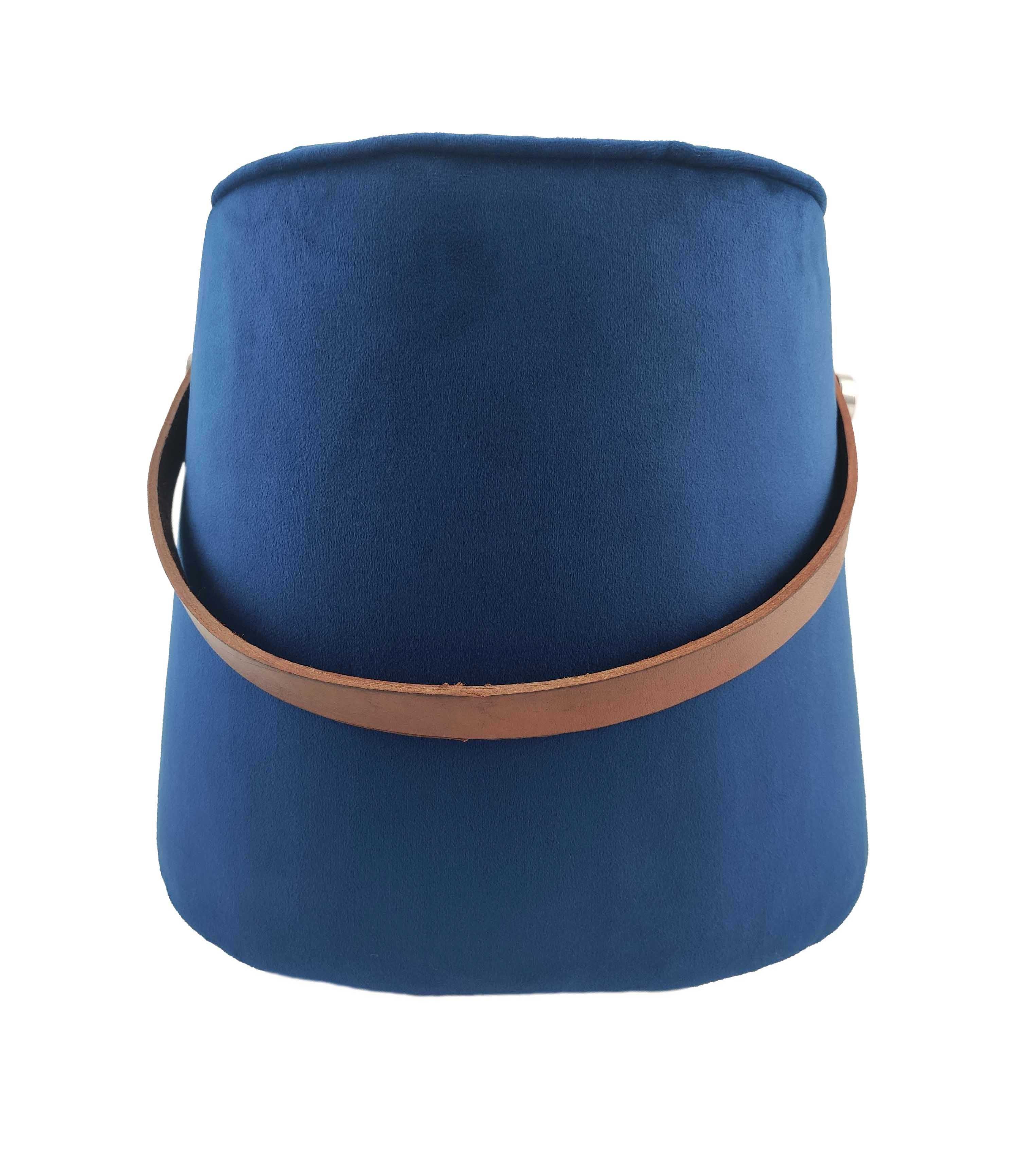 The RAMSHA HOME Leather Pedestal Pouf With Leather Handle is a round blue velvet pouf, featuring a smooth surface and a brown leather strap handle around its middle, shown against a white background.