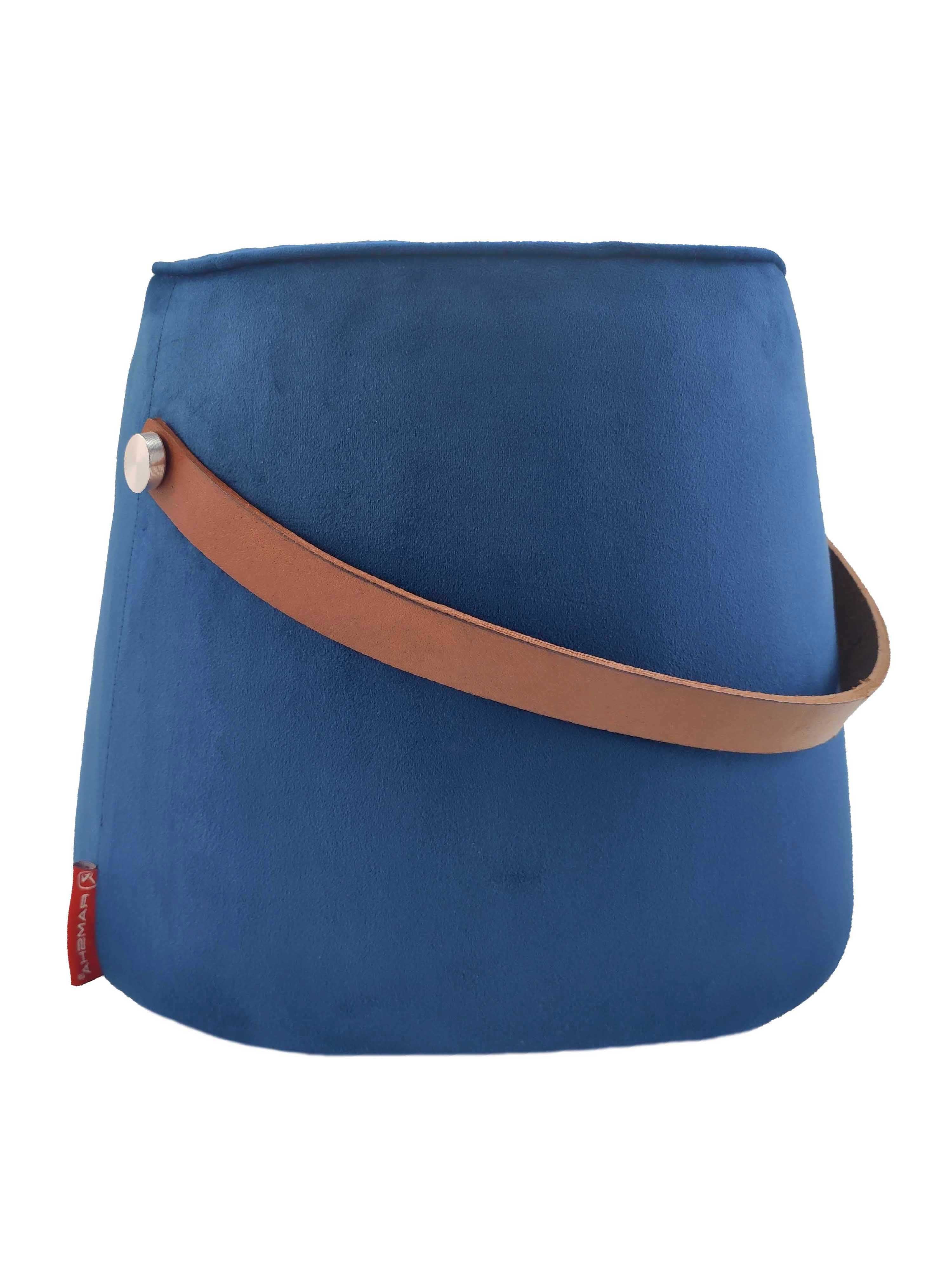 The RAMSHA HOME Leather Pedestal Pouf With Leather Handle is a blue, bucket-shaped piece featuring a leather handle secured with a silver button and a small red fabric tag on the side.