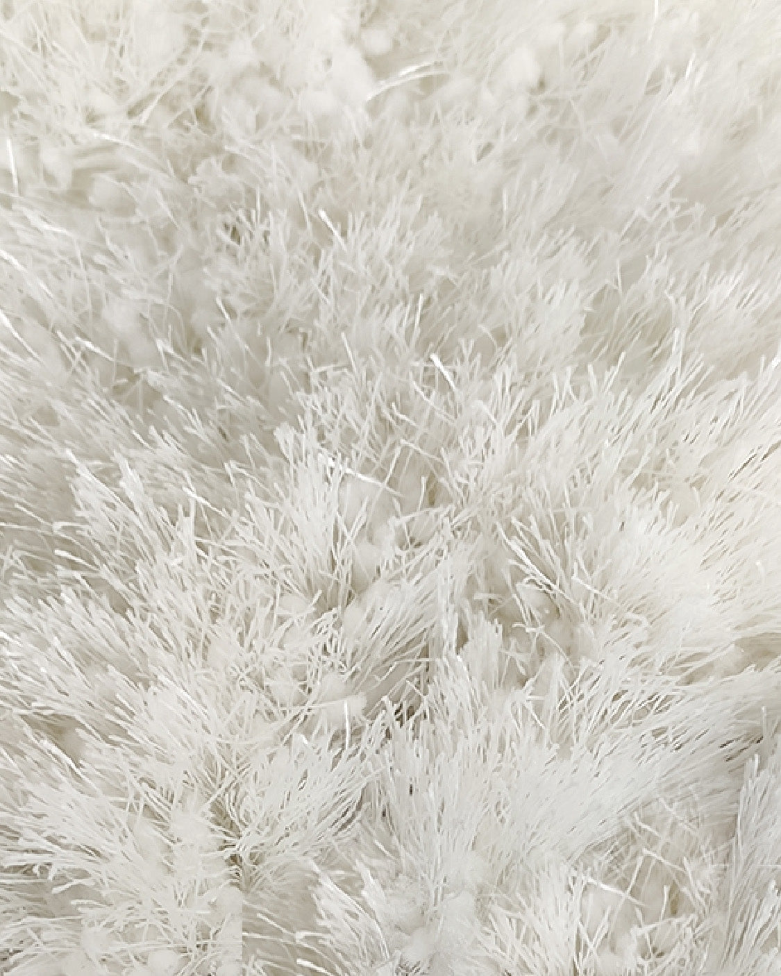 Close-up of the RAMSHA HOME White Color Entryway Decor Shaggy Rug - MPV 01 (250x350cm), showcasing its dense, fine fibers for a plush, cloud-like texture that adds softness and style to any entryway.