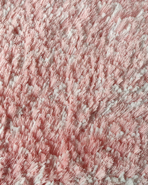 Close-up of RAMSHA HOME's Pink Color Modern Kids Room Decor Shaggy Rug - MPV 06 (200x300cm), showing its dense, tufted fibers and soft, textured surface for a cozy and stylish touch to any space.