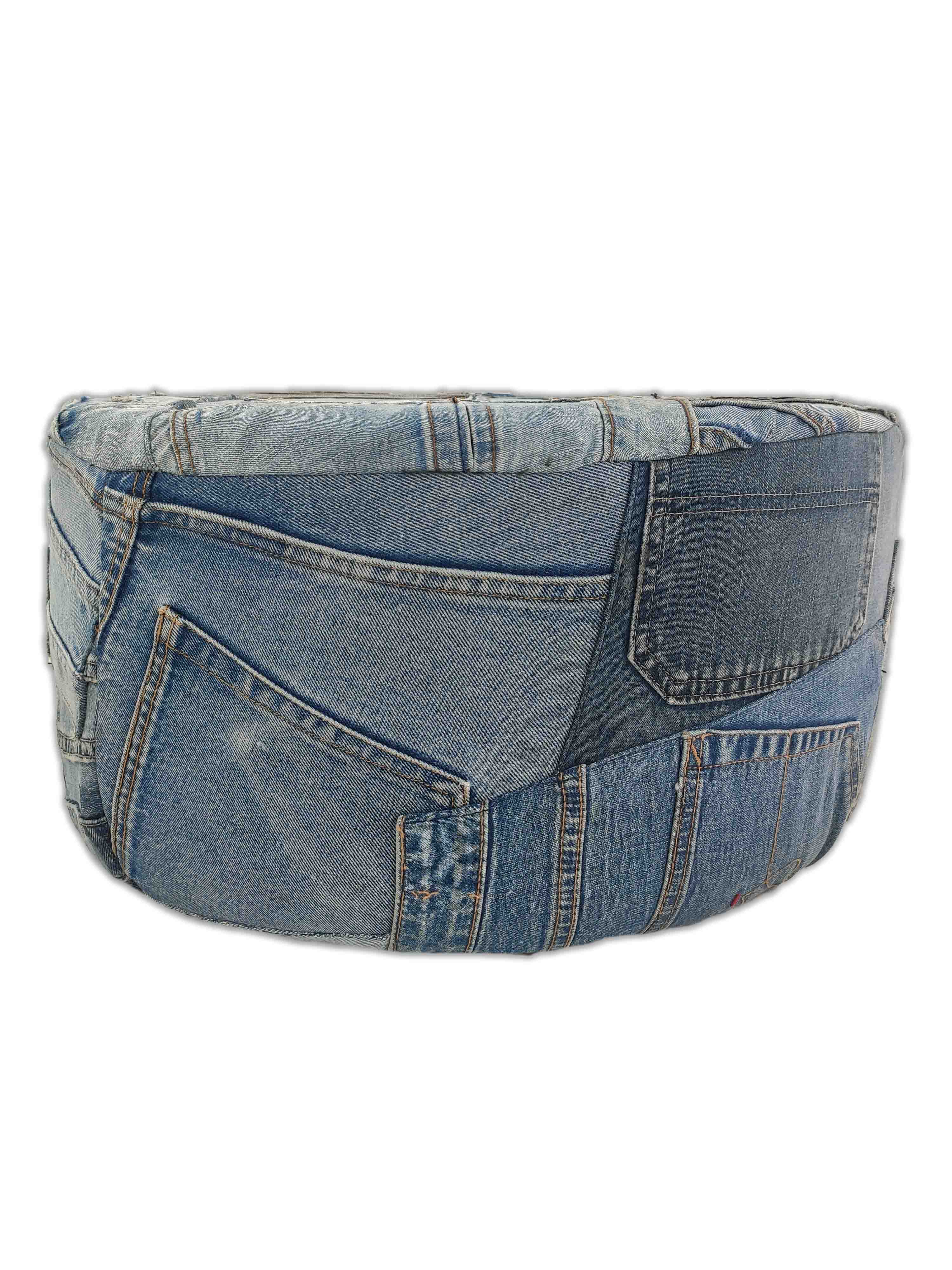 The RAMSHA HOME Denim Cotton Pouf PF-038 is a round ottoman upholstered in blue denim fabric, featuring visible jeans-style pockets and seams, and stands out elegantly against a white background.