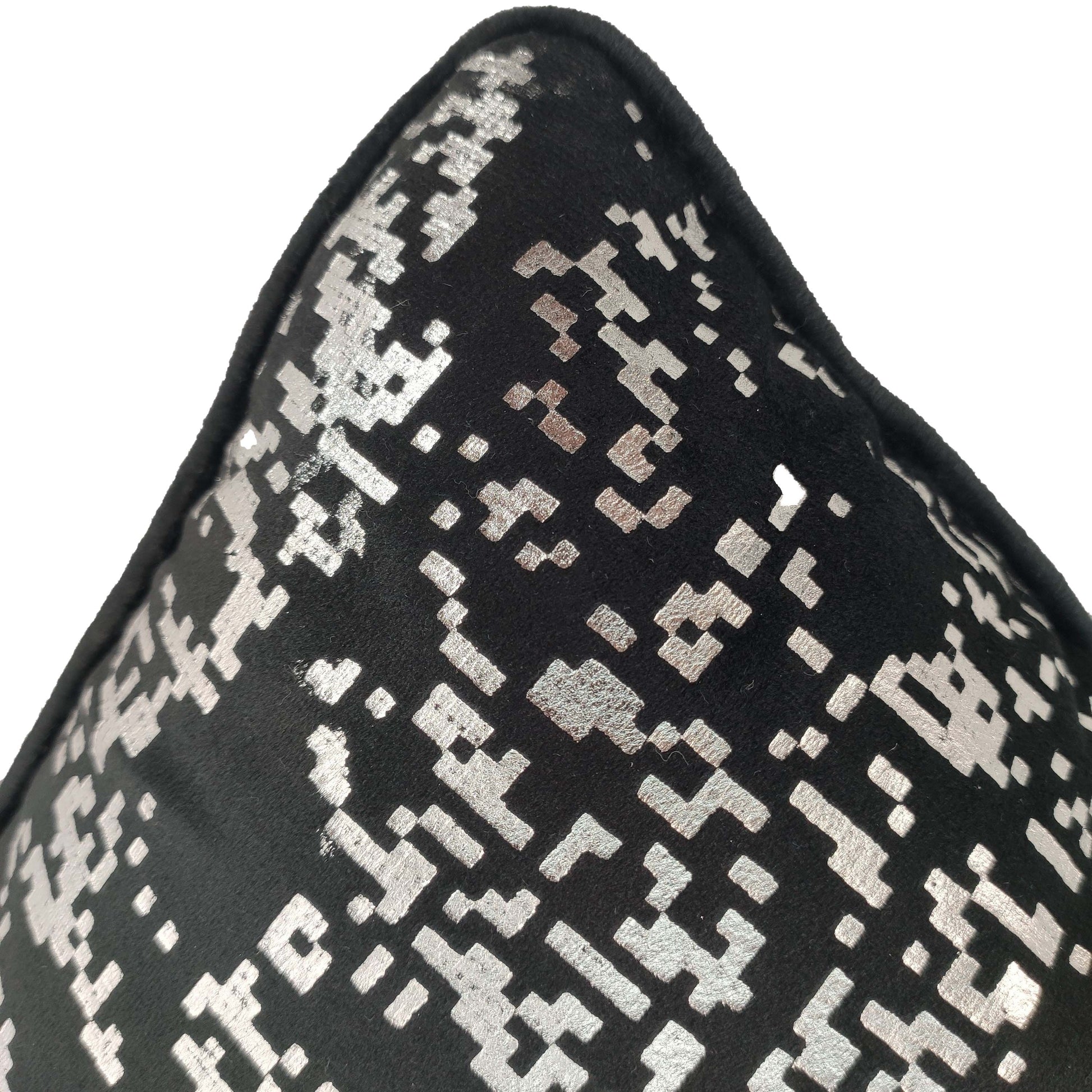 Close-up of RAMSHA HOME’s Polyester Black & Silver Cushion Cover CS-128, featuring a textured, pixelated geometric pattern—a modern accent for any home décor, shown here against a plain white background.