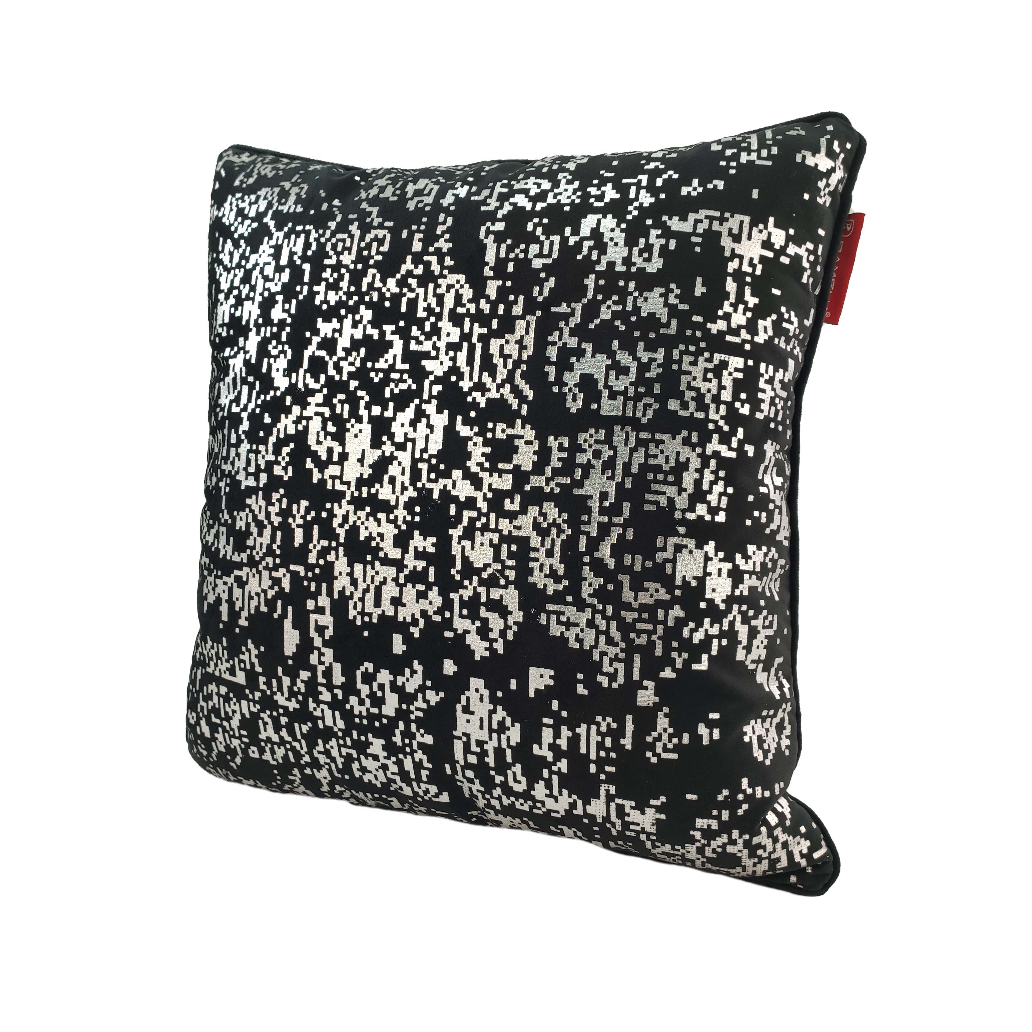 The RAMSHA HOME Polyester Black & Silver Cushion Cover CS-128 features a black base with an abstract pixelated white and gray design, plus a small red side tag—ideal for stylish home décor.