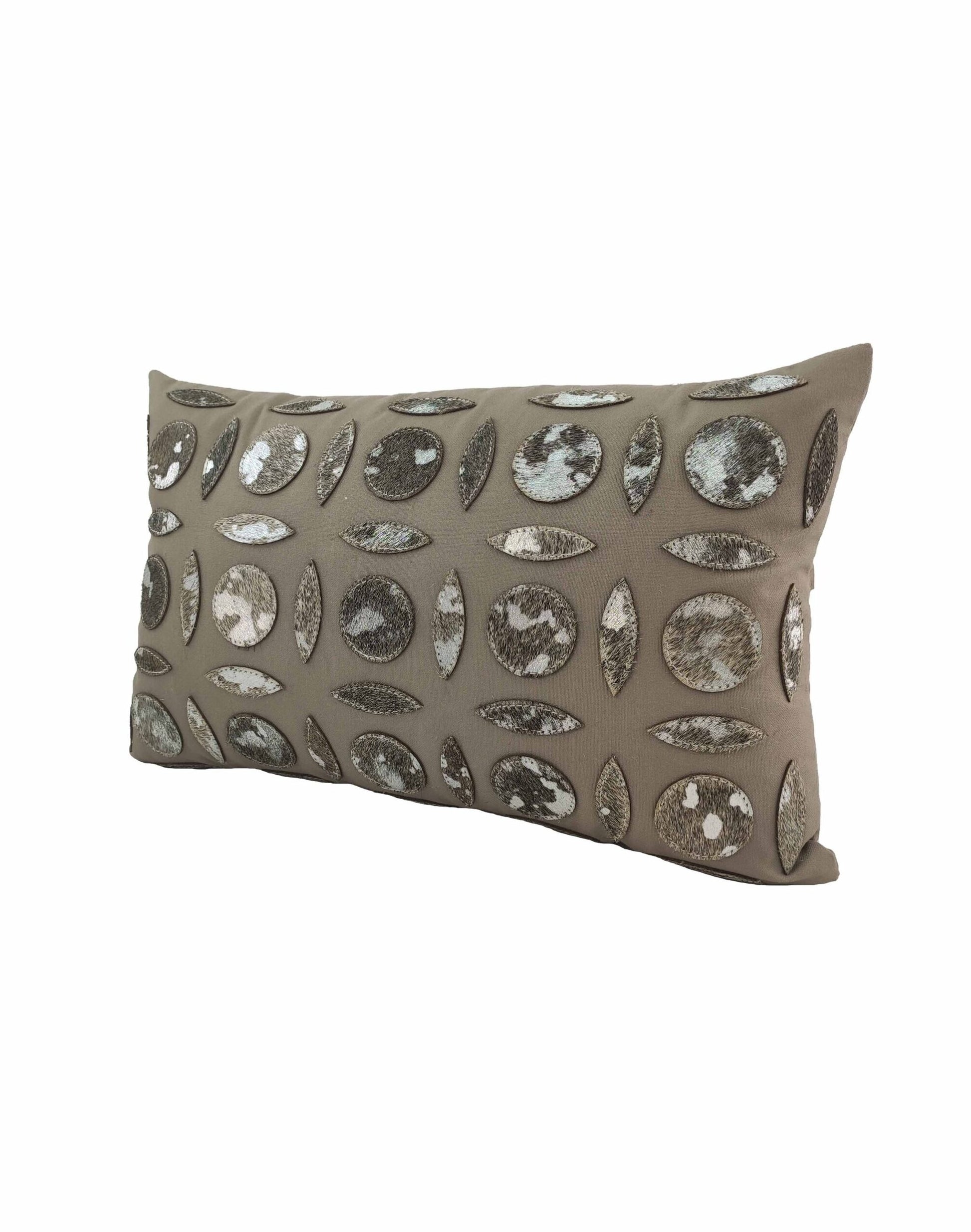 The RAMSHA HOME Polyester & Leather Cushion CS-101 is a rectangular taupe pillow with embroidered oval and circular patterns in metallic and neutral tones, offering textured elegance and lasting comfort for any living space.